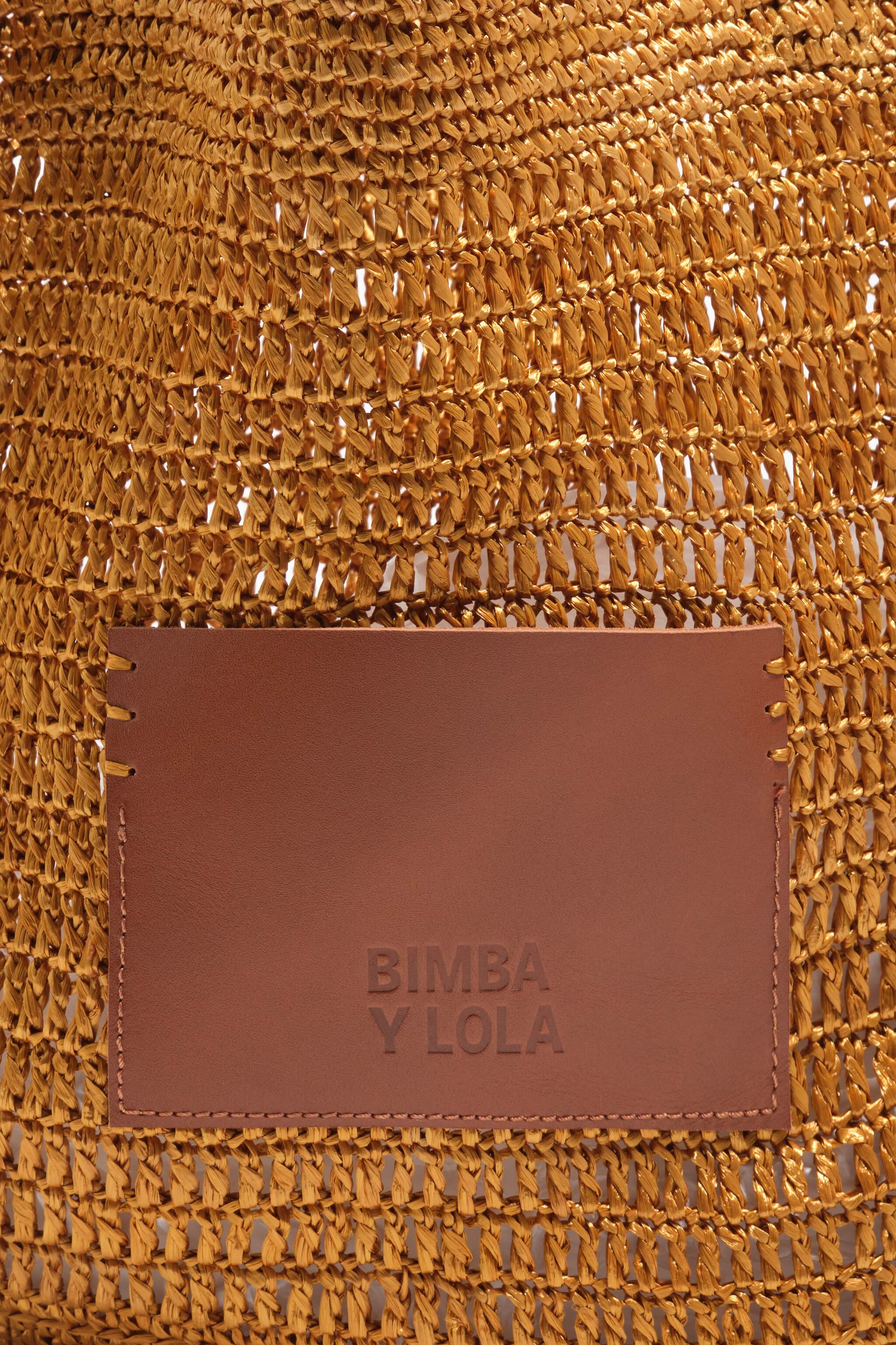 Bolso grande con trenzado dorado
