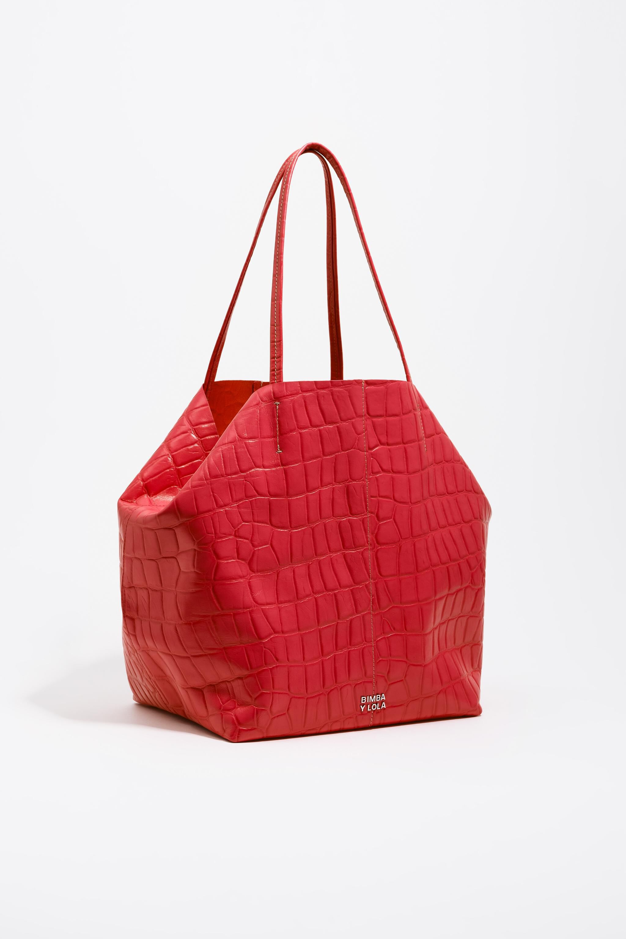 Bolso de mano de cuero grande en rojo con estampado de cocodrilo