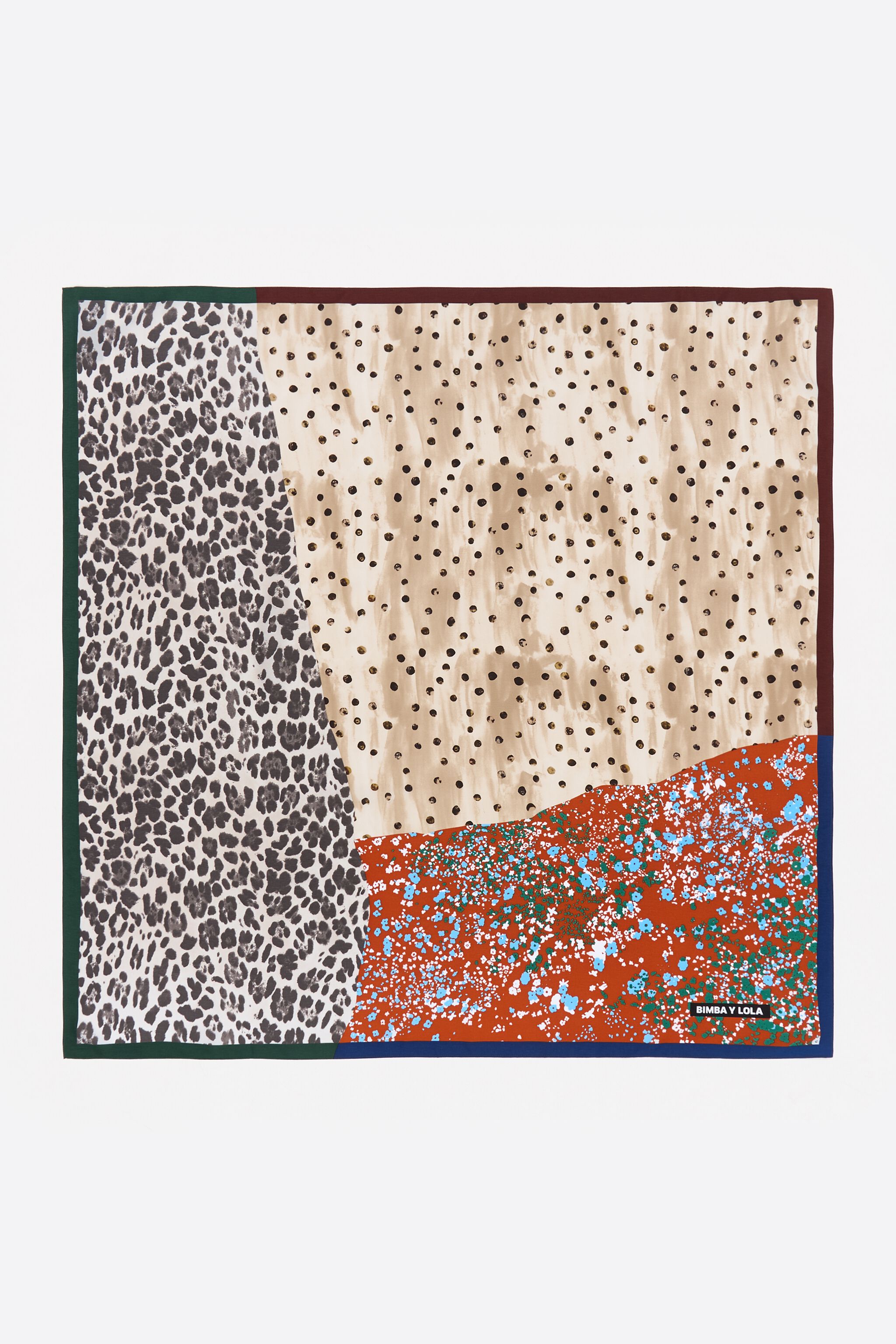Pashmina de tono naranja oscuro con parches
