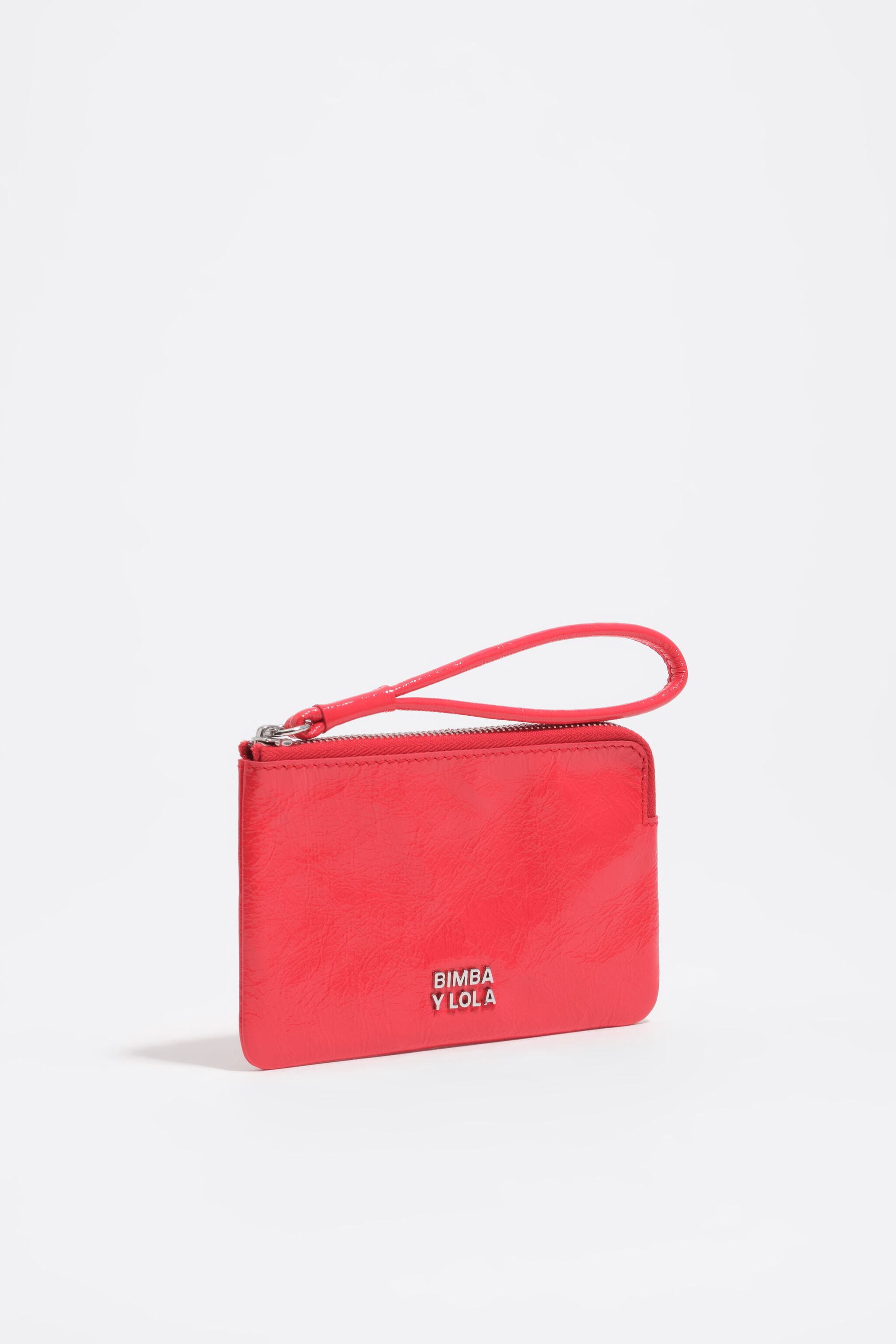 Monedero pequeño brillante de cuero rojo ácido