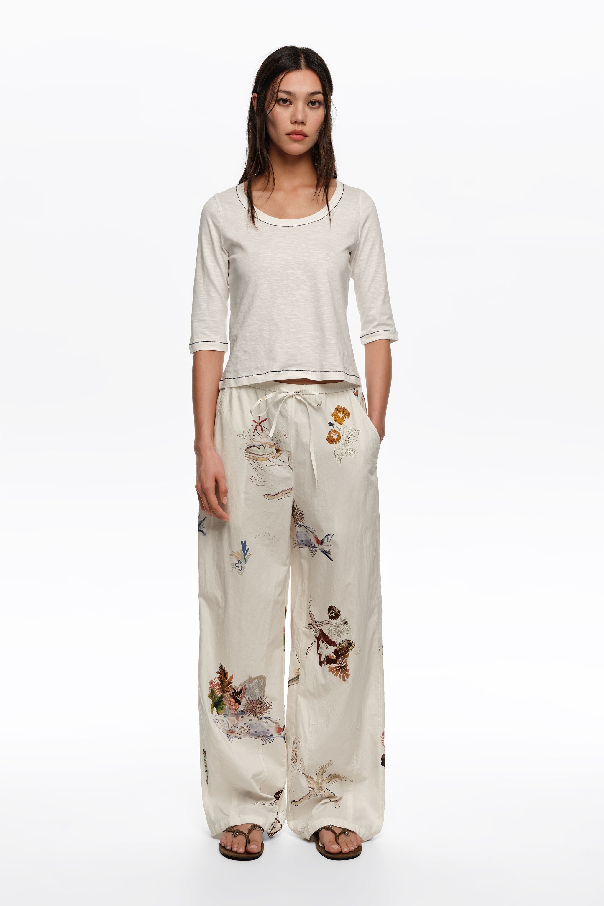 Pantalones jogger de algodón color marfil