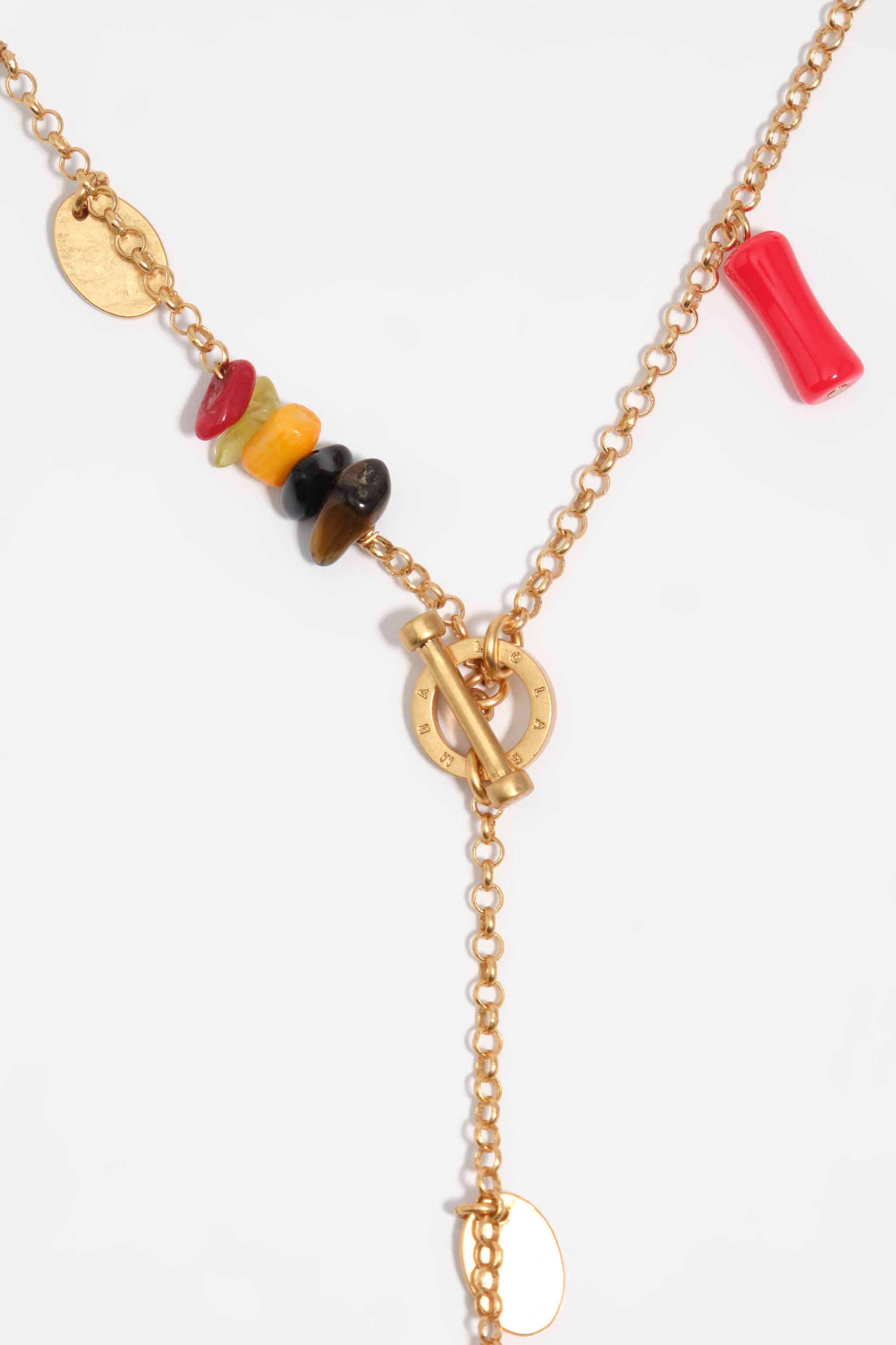 Collar de oro envejecido con piedras y conchas