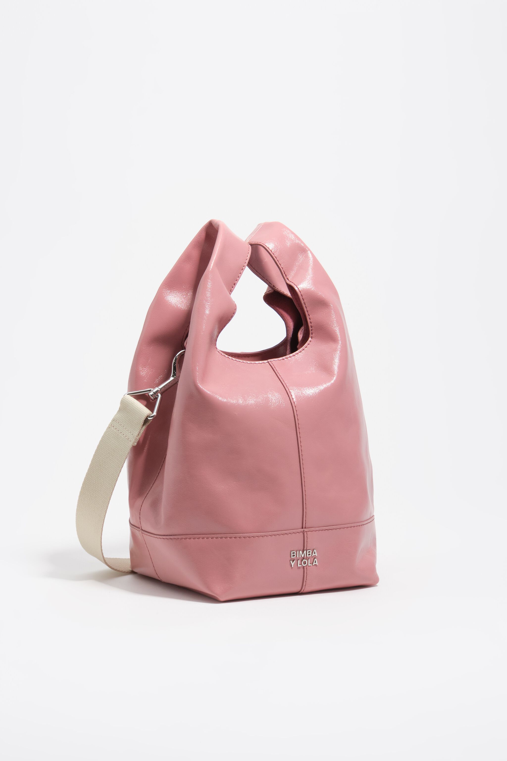 Bolso de papel de cuero rosa medio