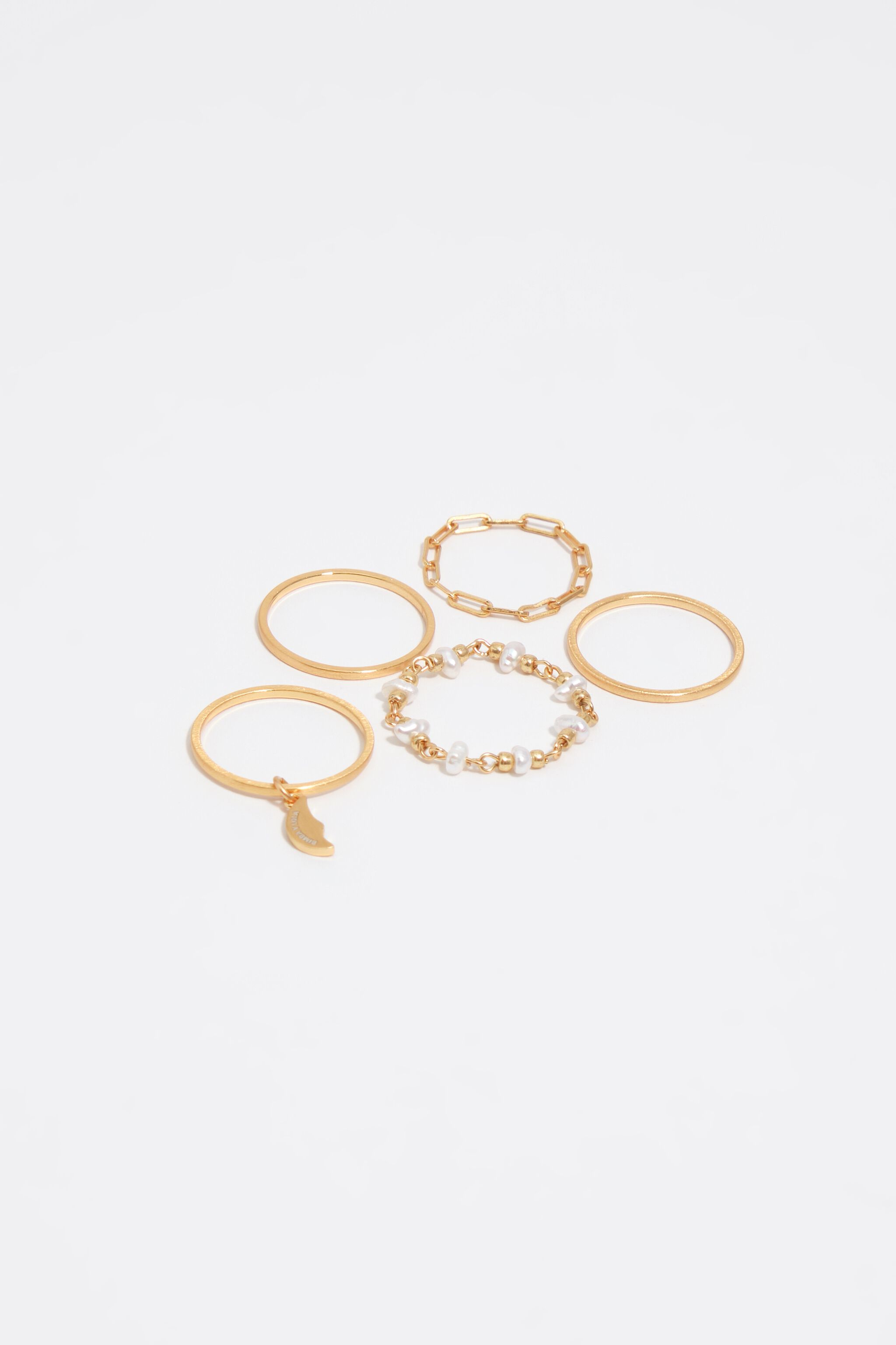 Conjunto de 5 anillos de luna con perlas y acabado dorado cepillado