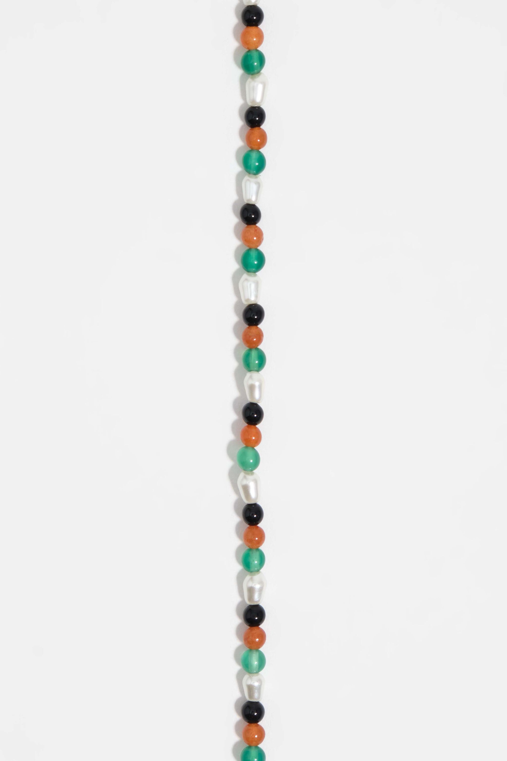 Collar de cadenas y piedras doradas