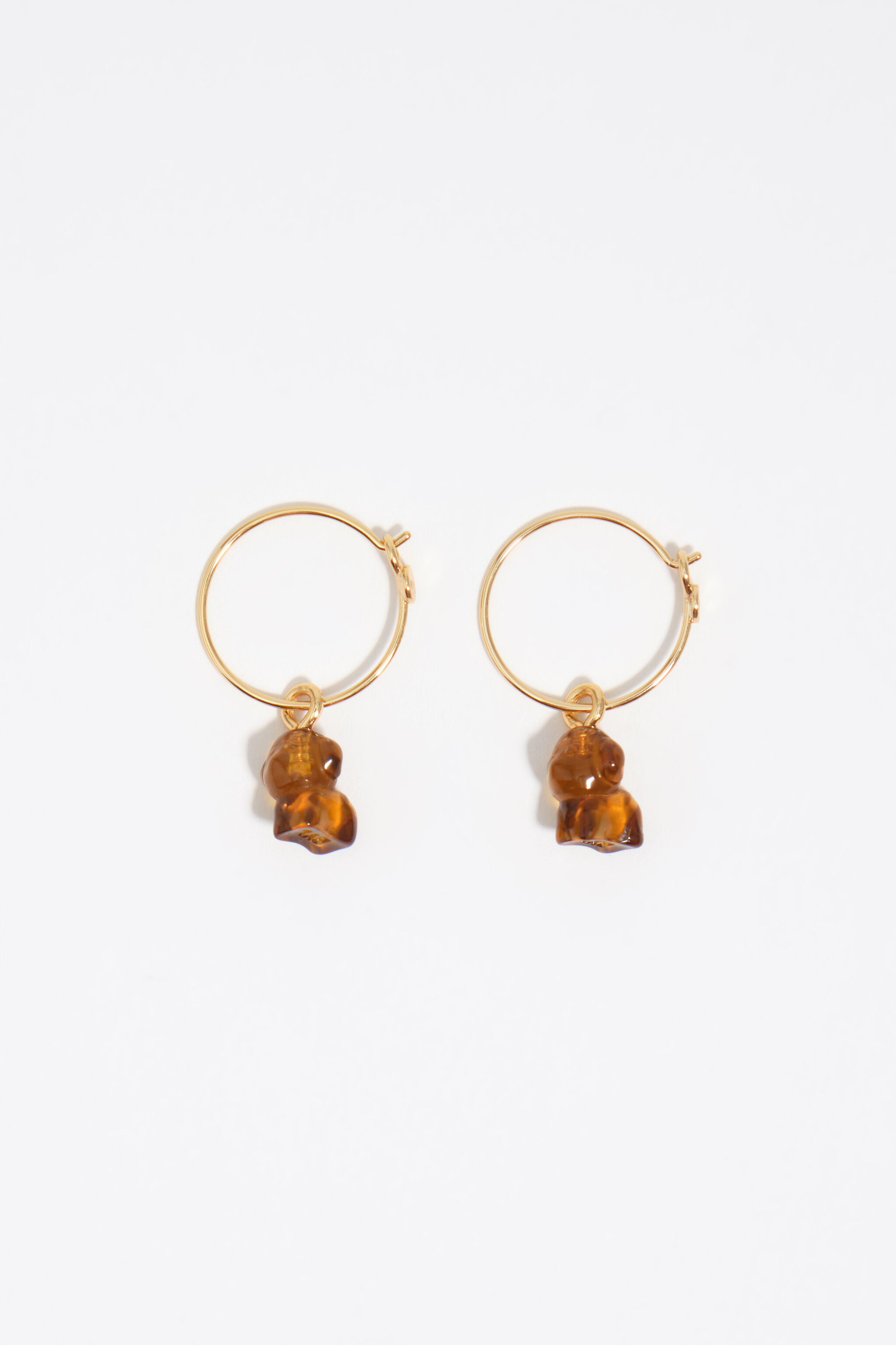 Aretes de aro para perro de resina marrón