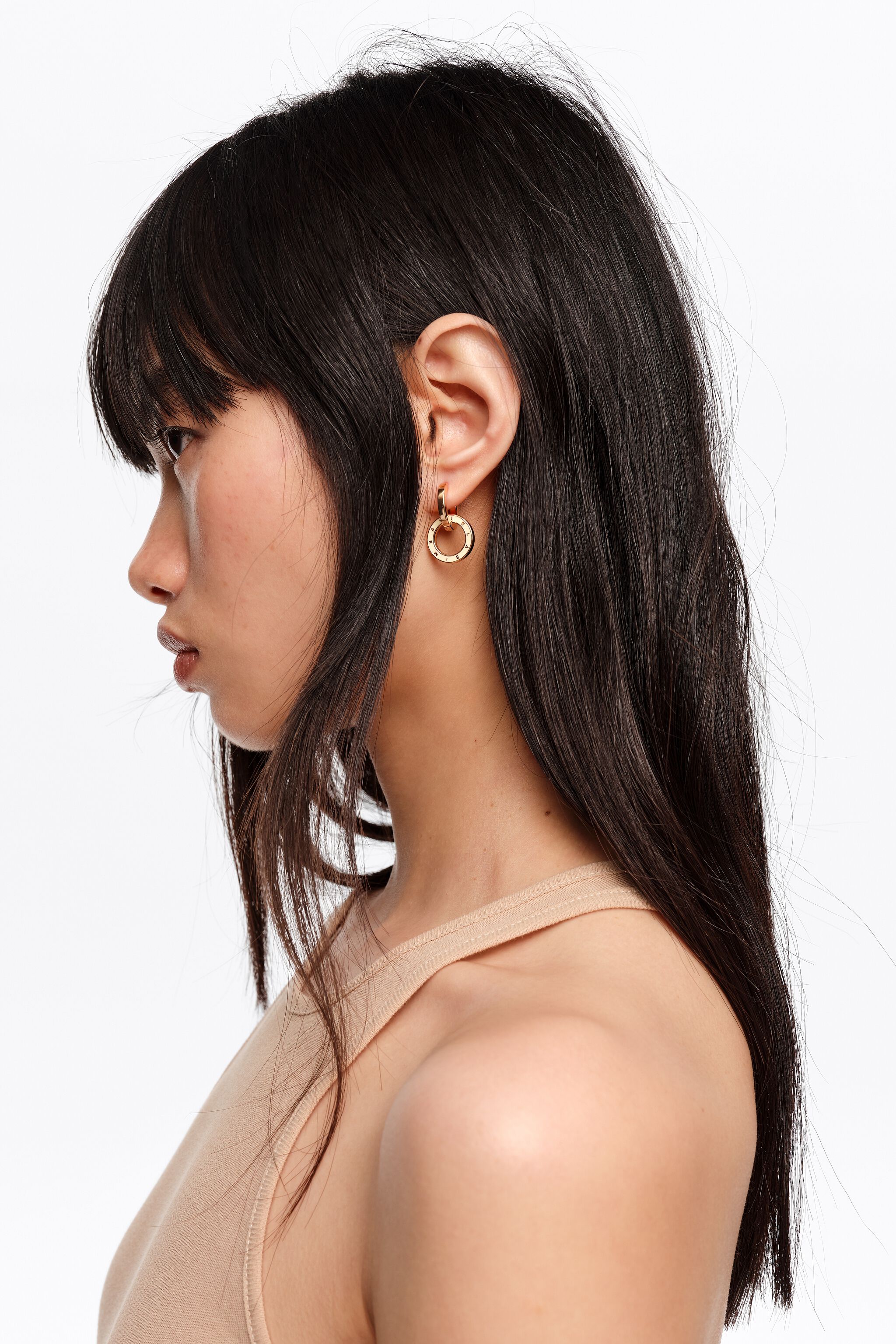 Aretes de doble aro con logotipo marfil