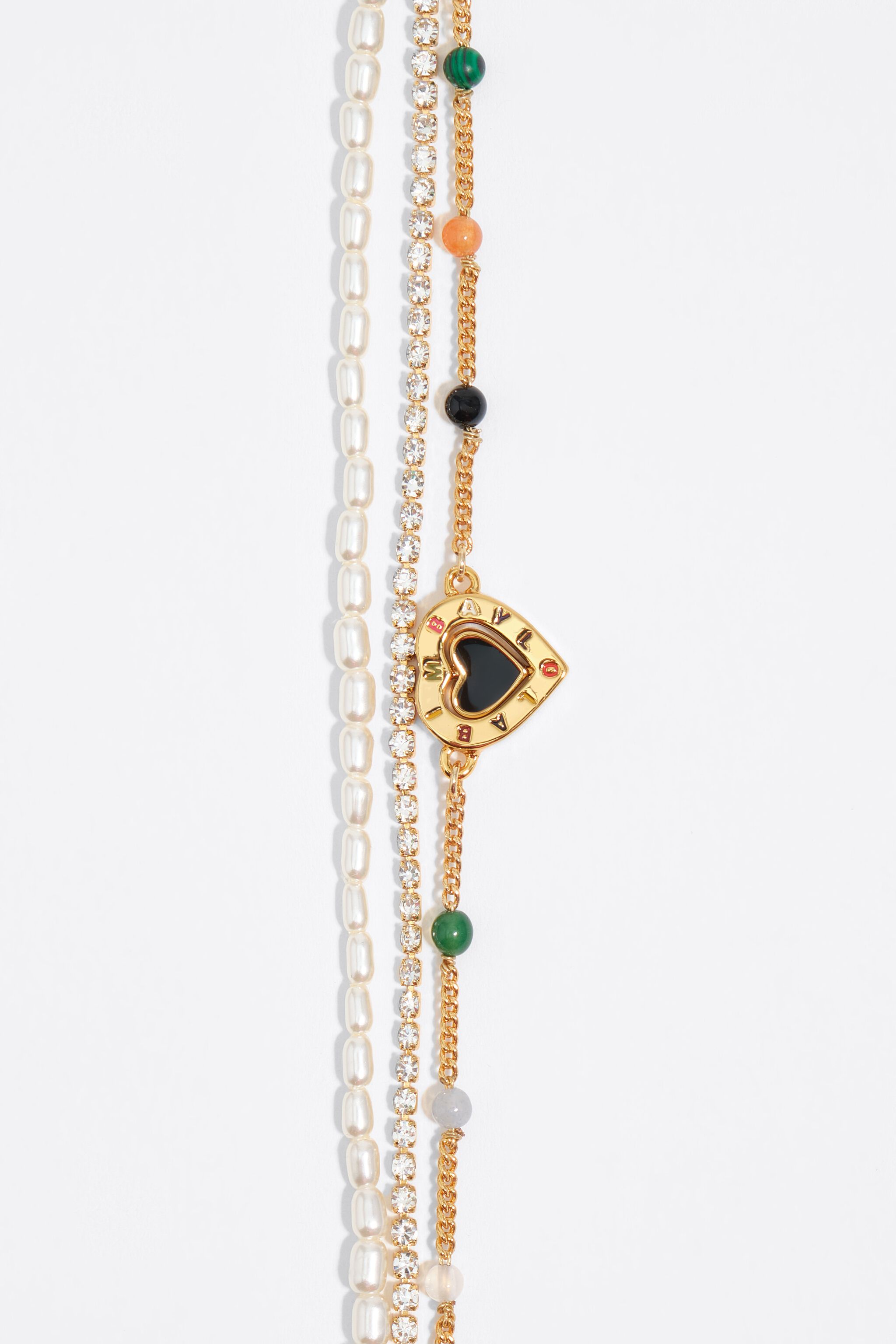 Collar con piedras triple con logotipo de corazón