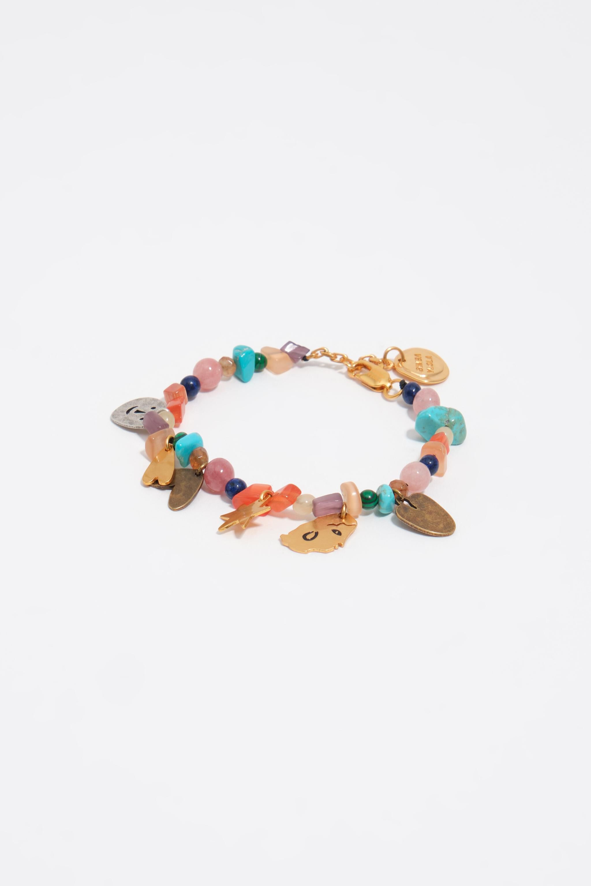 Pulsera con siluetas metálicas y piedras multicolor