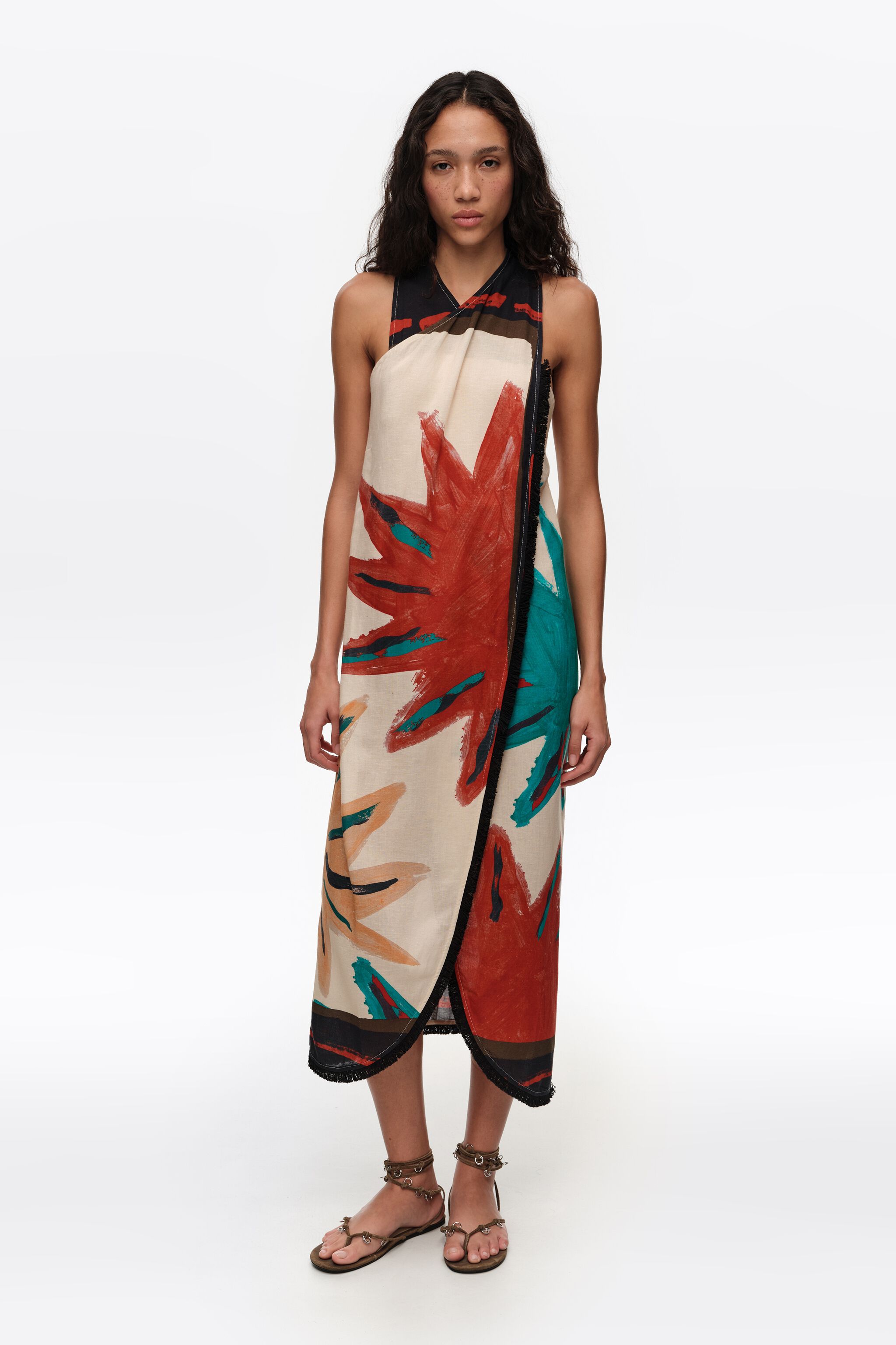 Vestido midi envolvente con flecos de posición solar