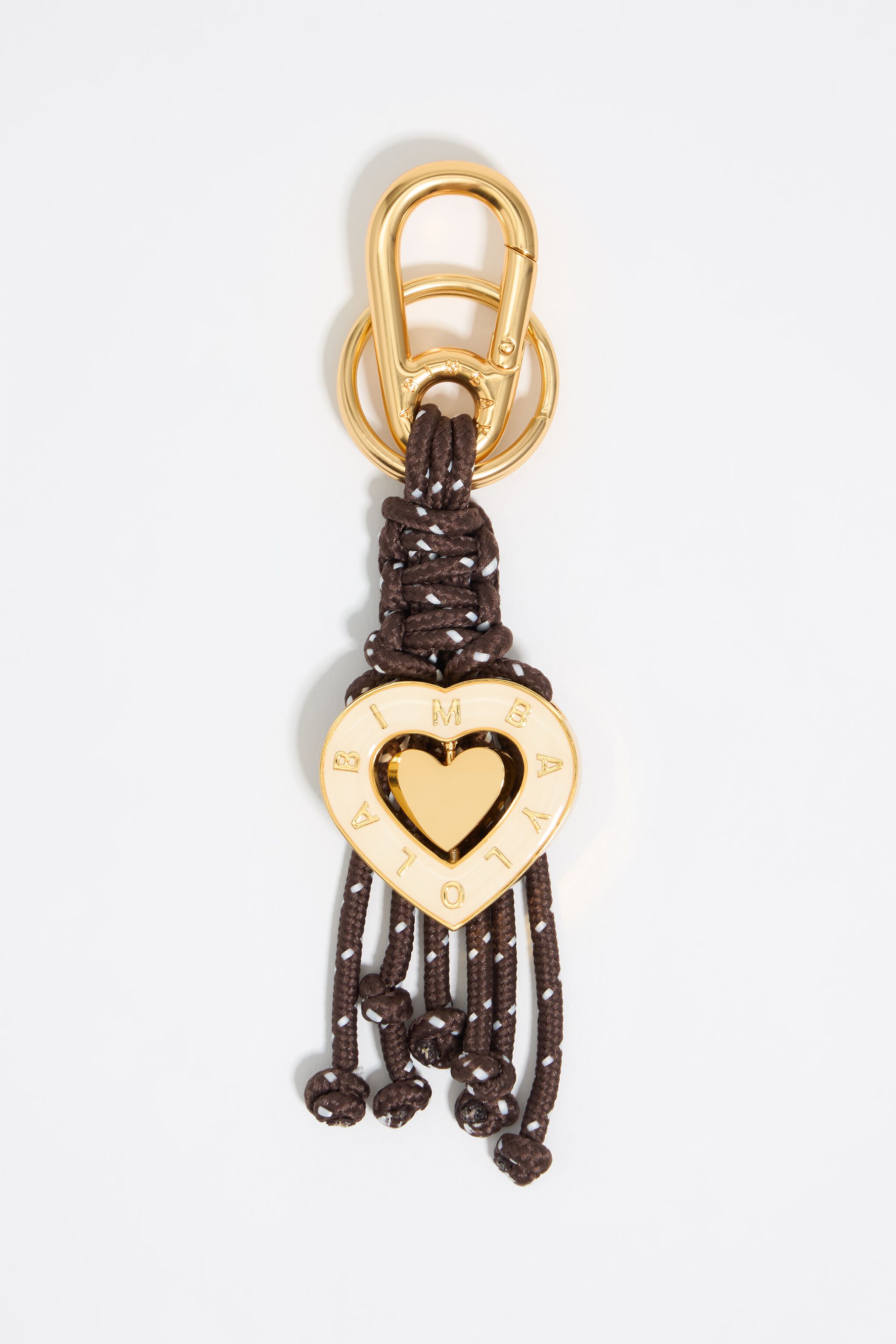 Anillo de llaves con forma de corazón en marfil con cuerdas