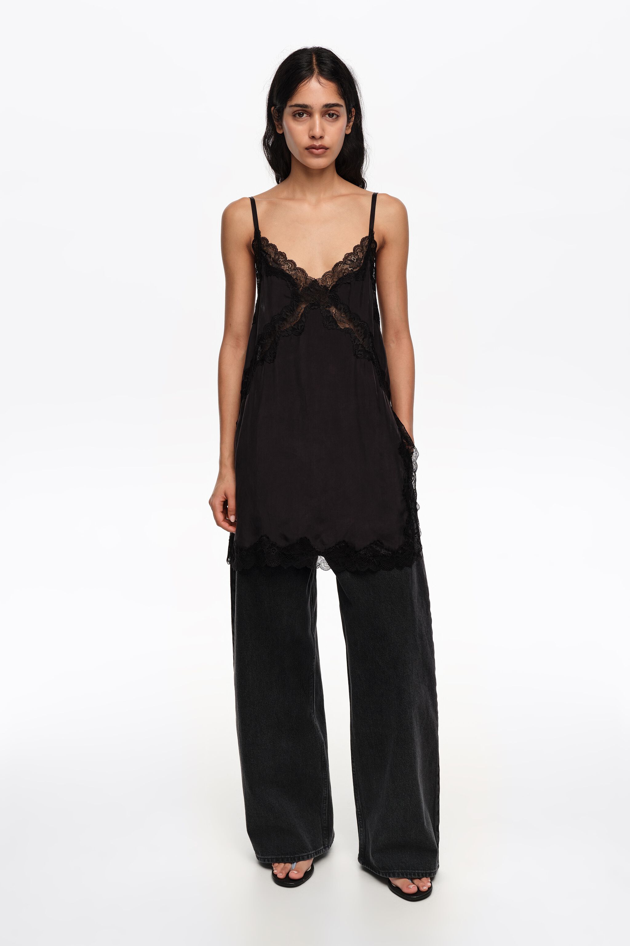 Pantalones de mezclilla negra lavada de pierna ancha