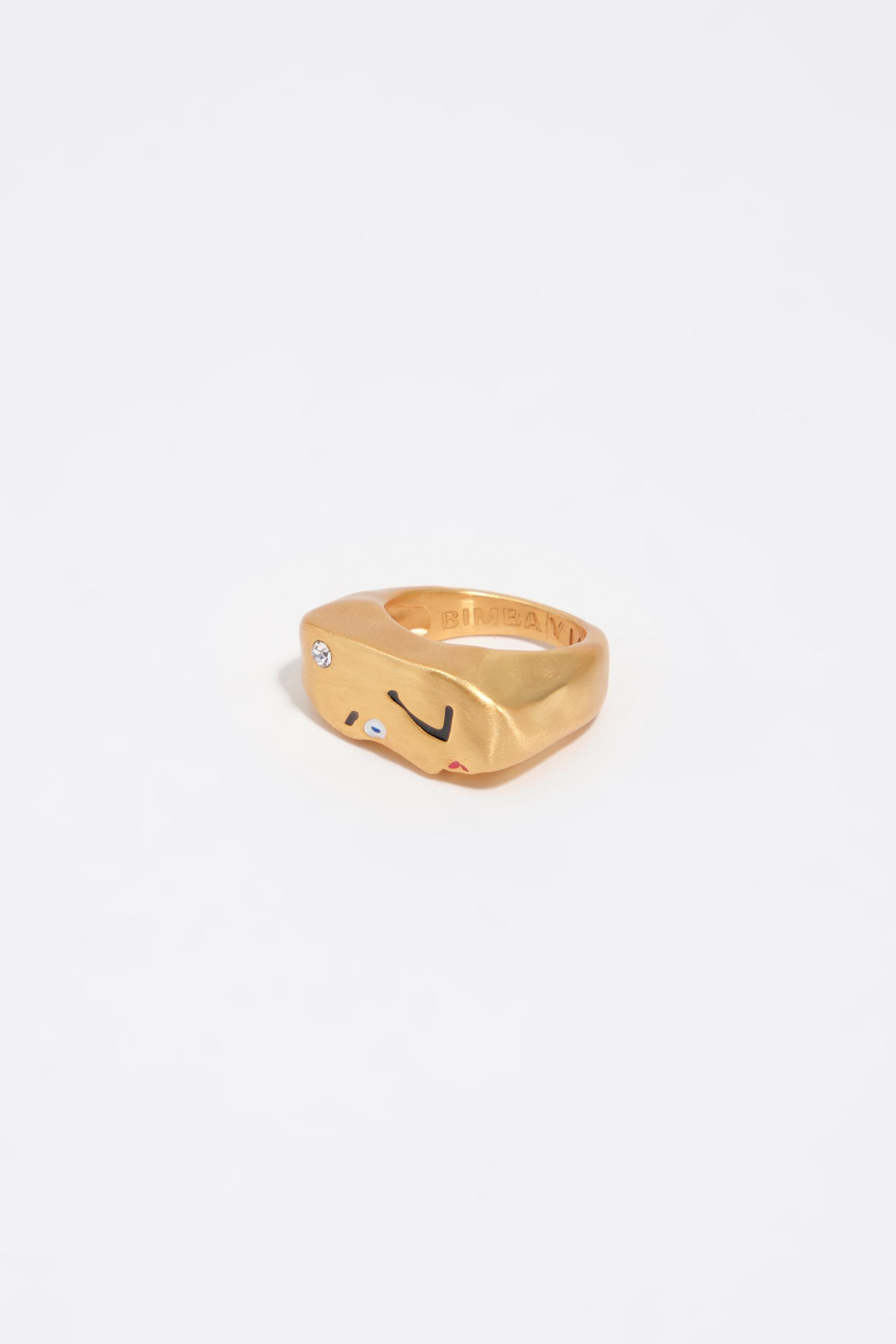 Anillo facial y de cristal en dorado mate