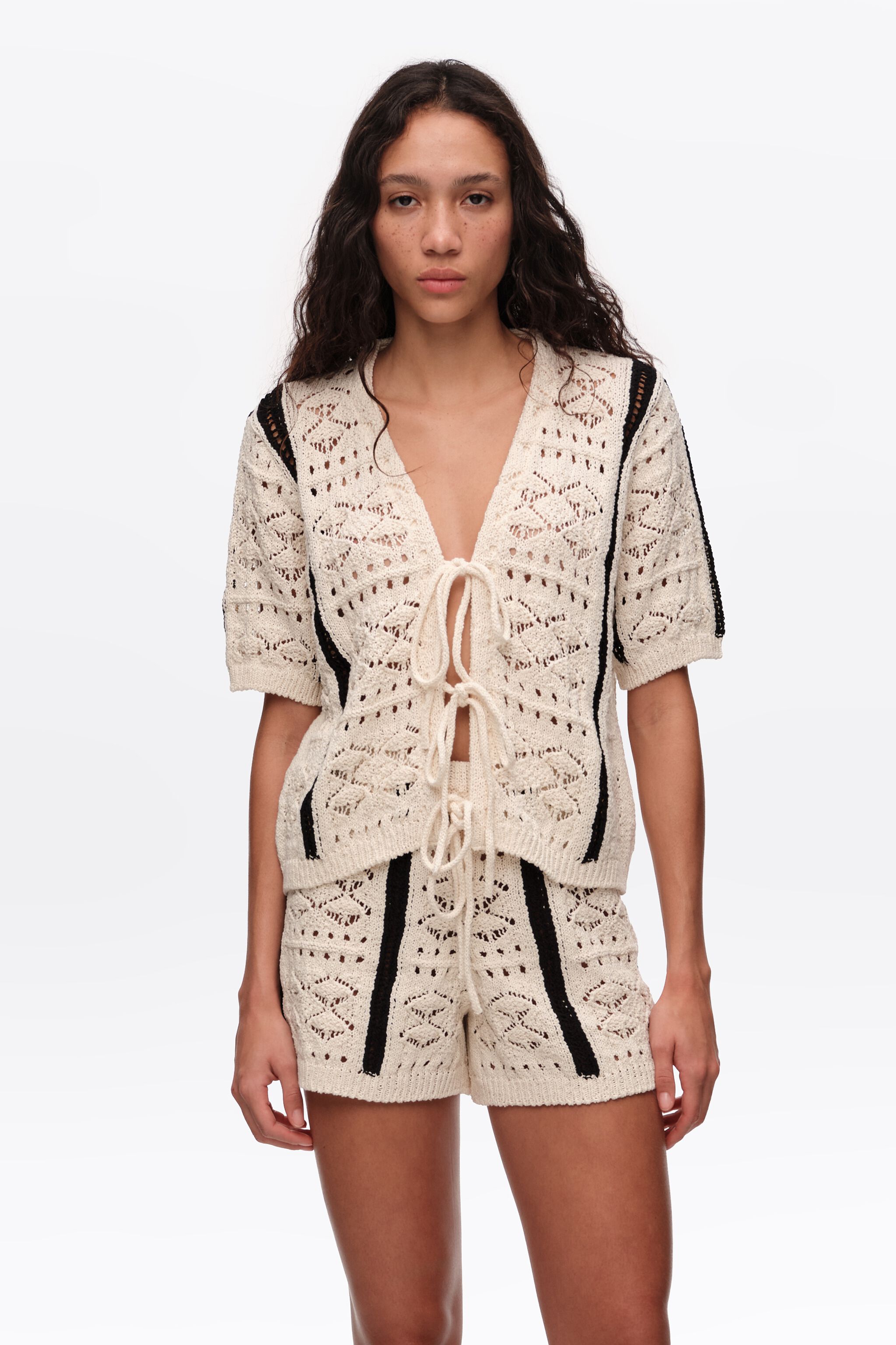 Cardigan de punto bicolor marfil
