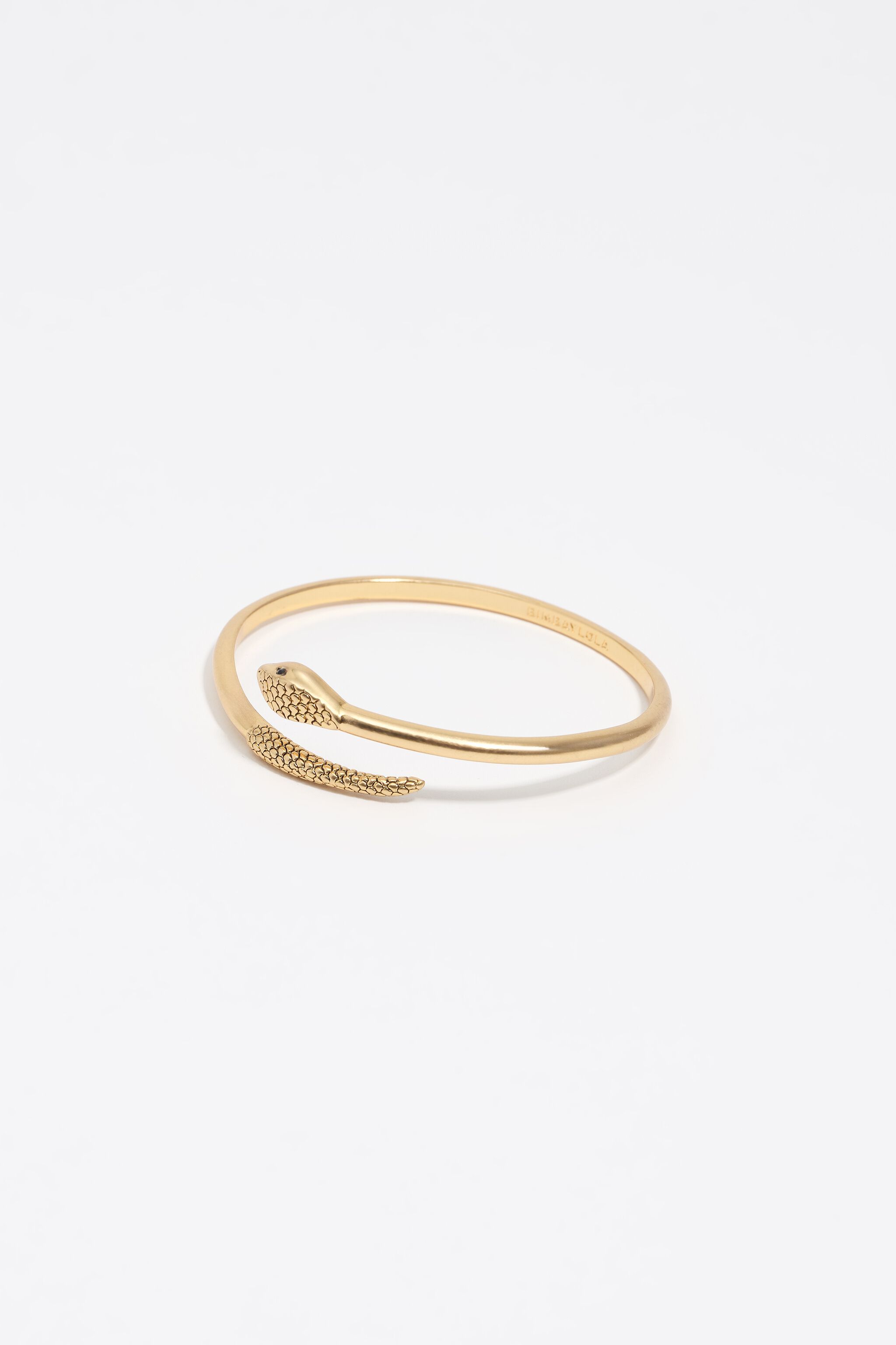 Pulsera de serpiente rígida con textura dorada envejecida