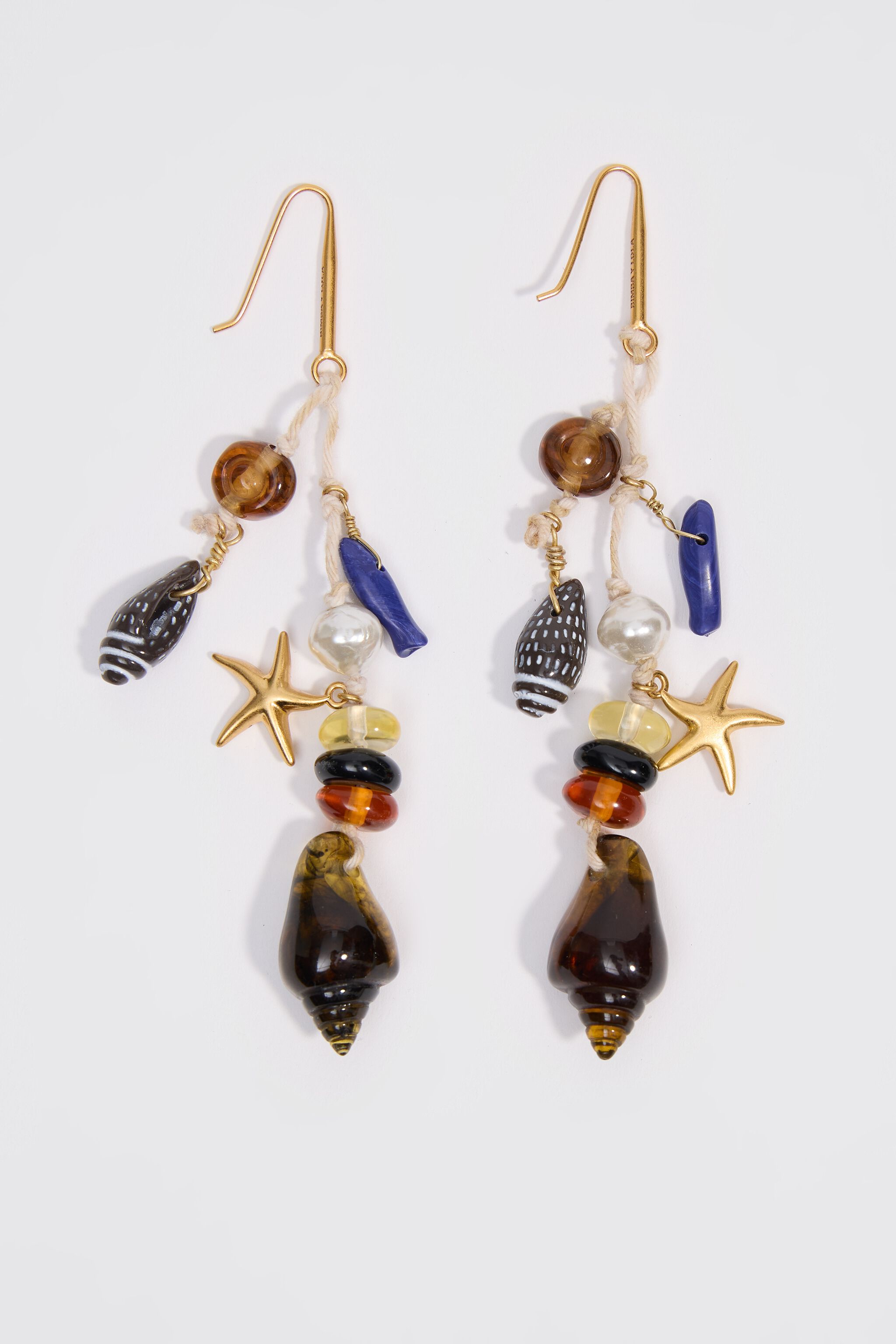 Auriculares de estrella de mar ámbar y concha marina