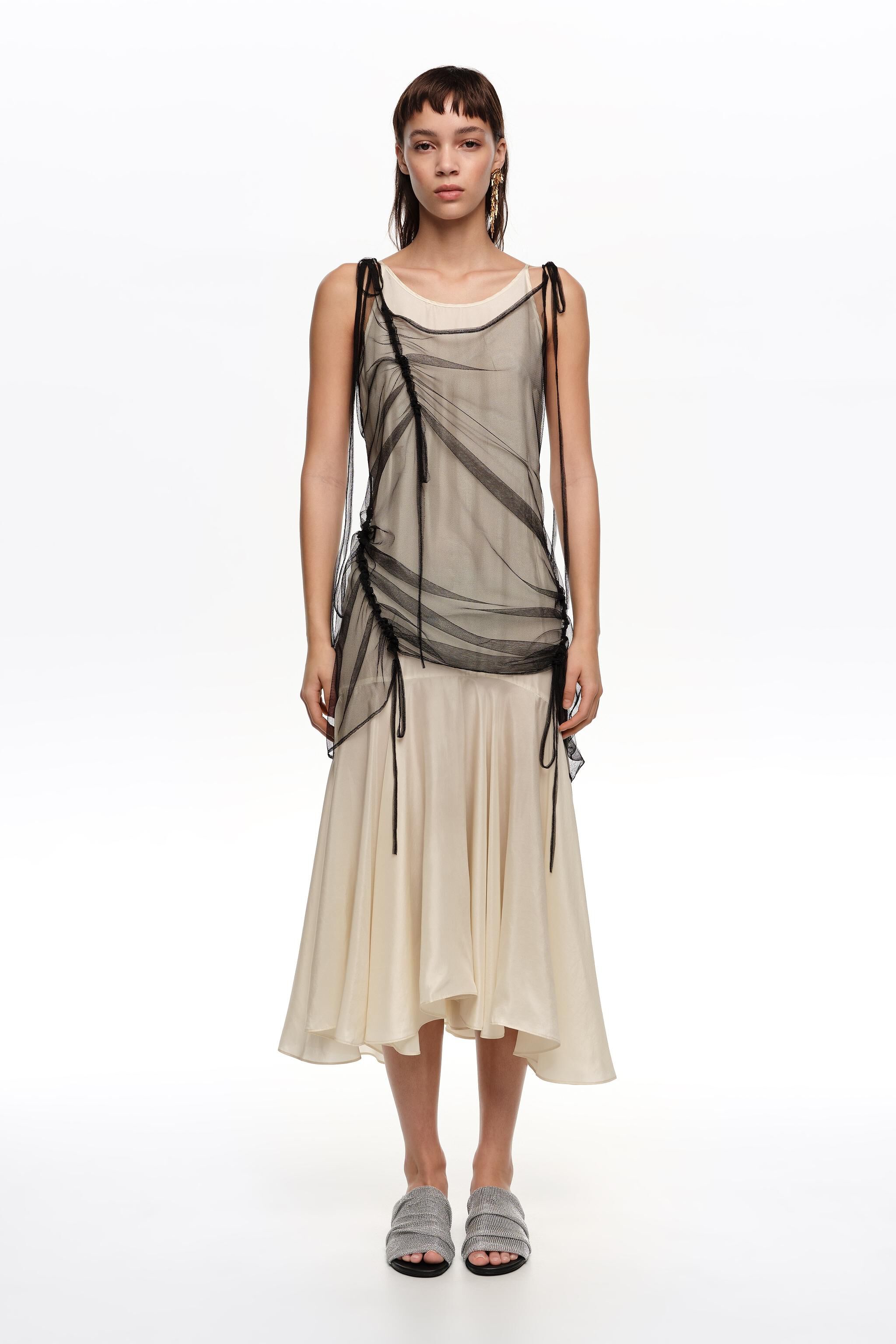 Vestido camisola con forro de malla negra