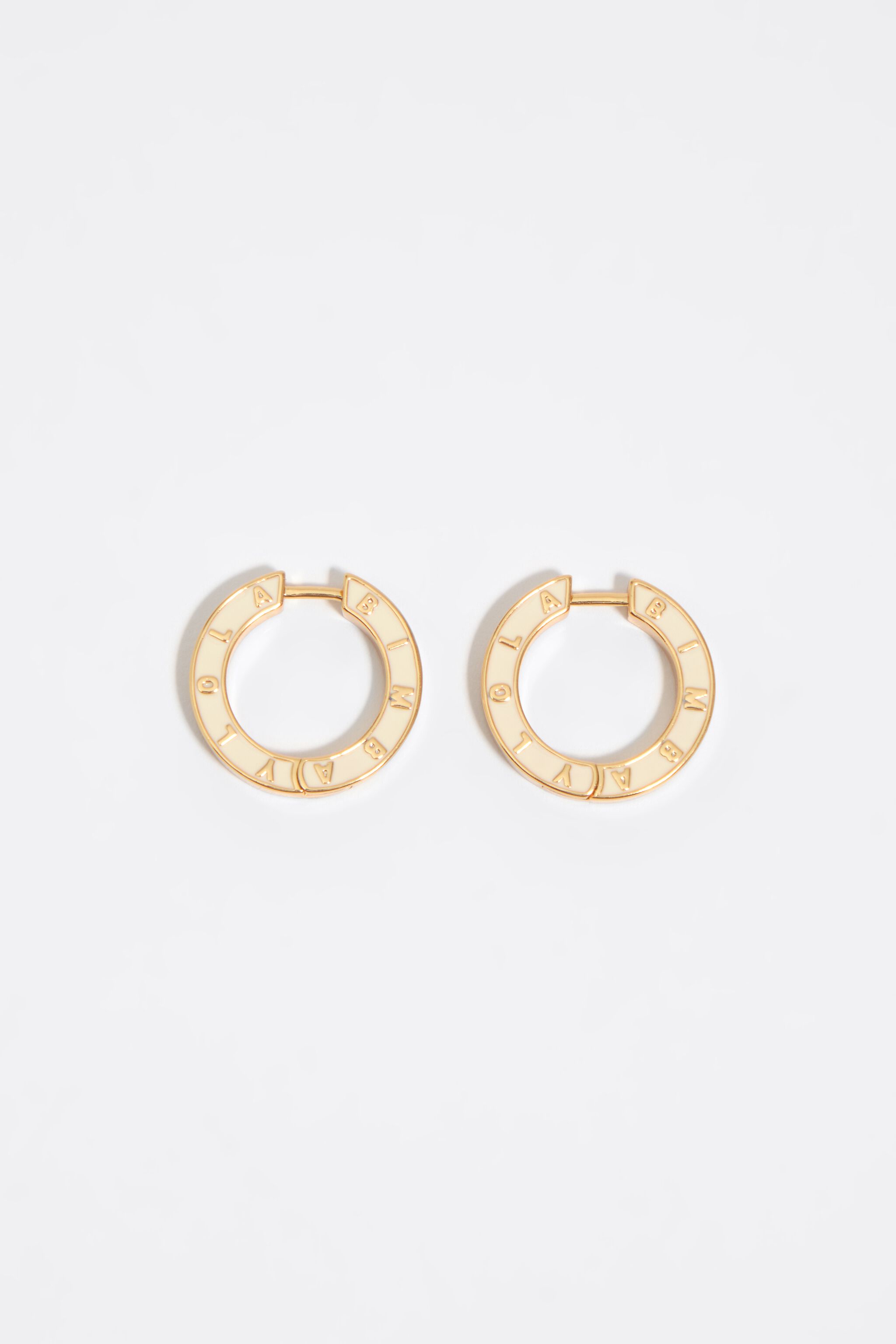 Aretes de aro con logotipo marfil