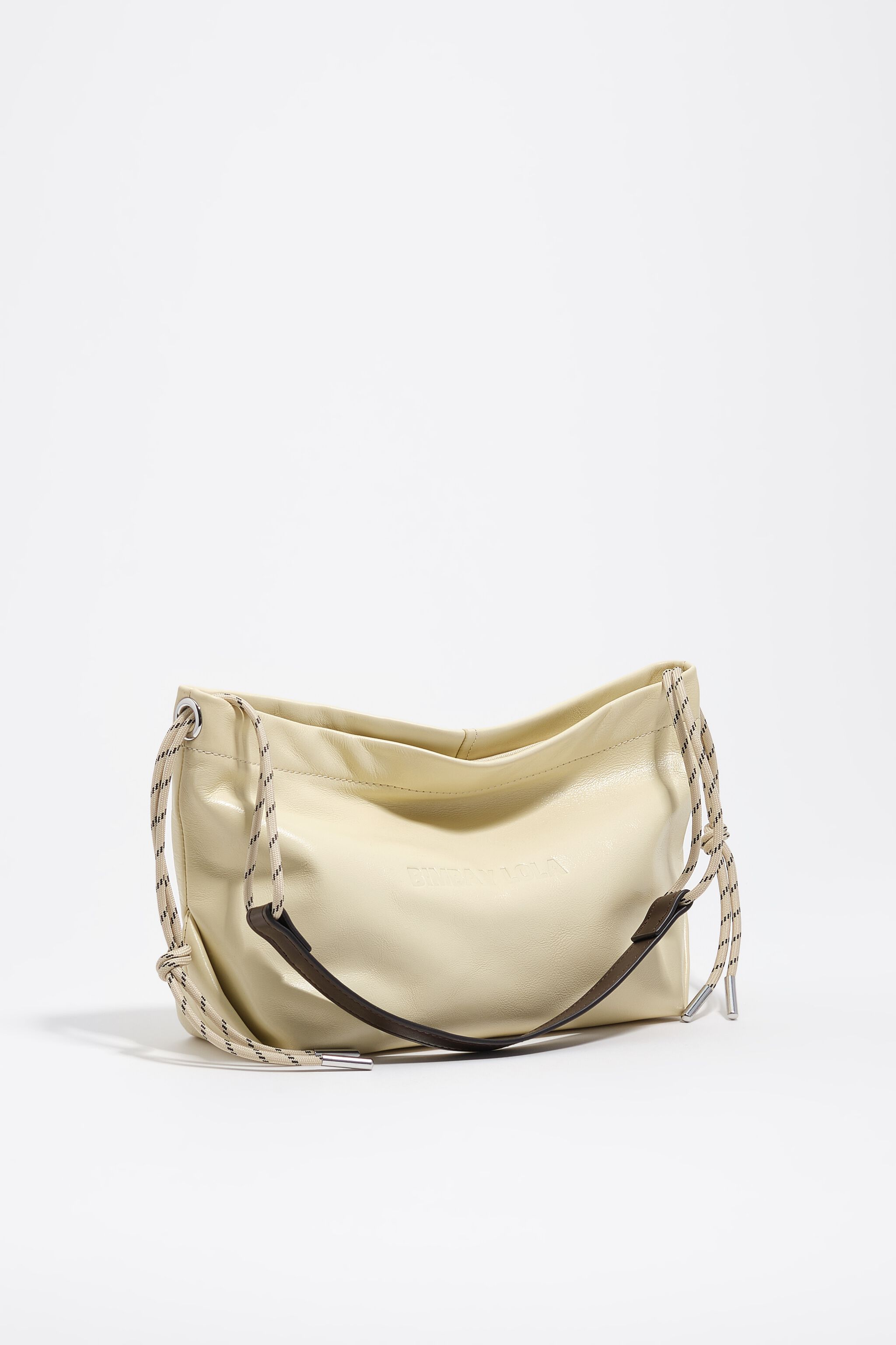 Bolso bandolera de cuero amarillo pálido mediano