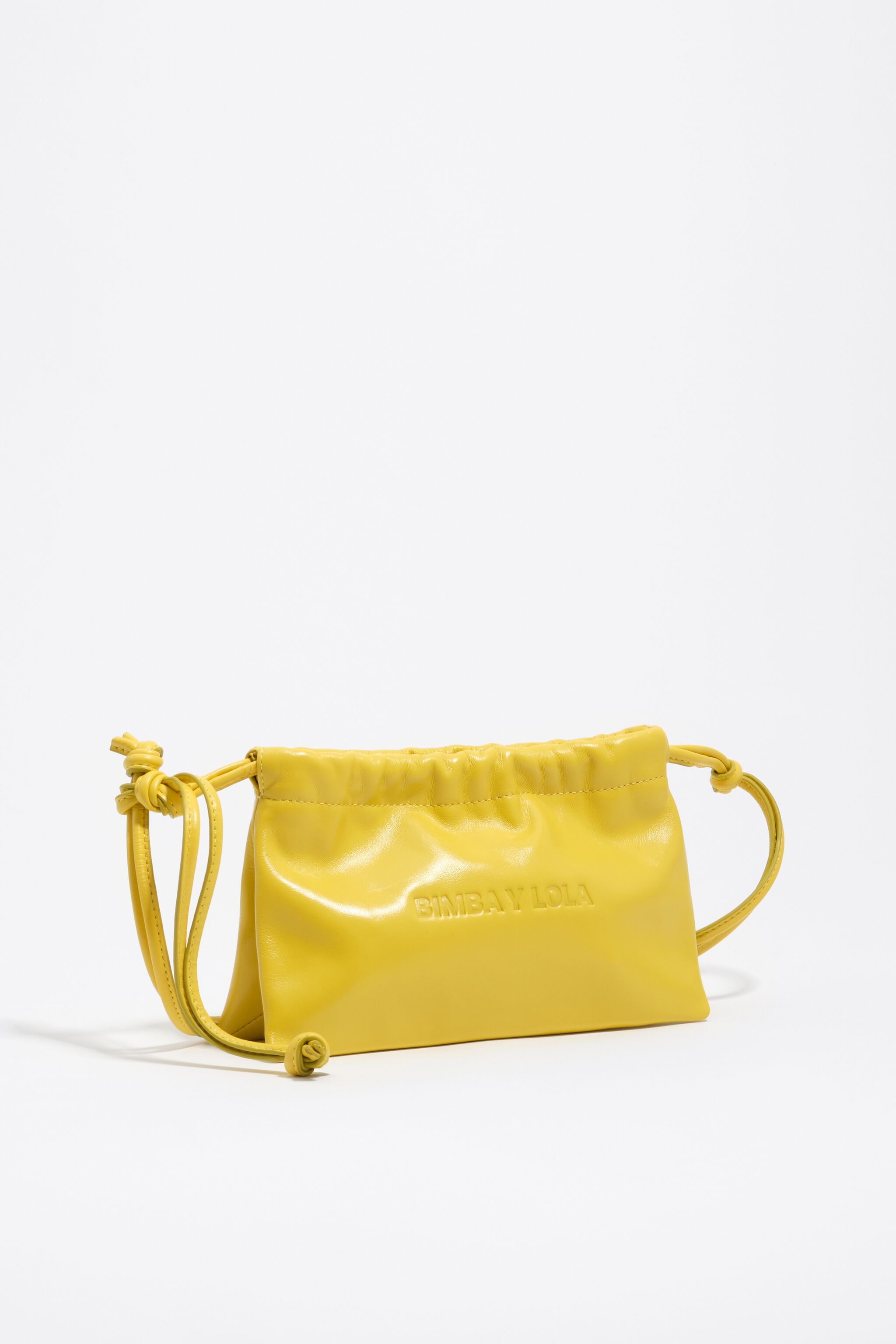 Bolso de mano mini de cuero amarillo