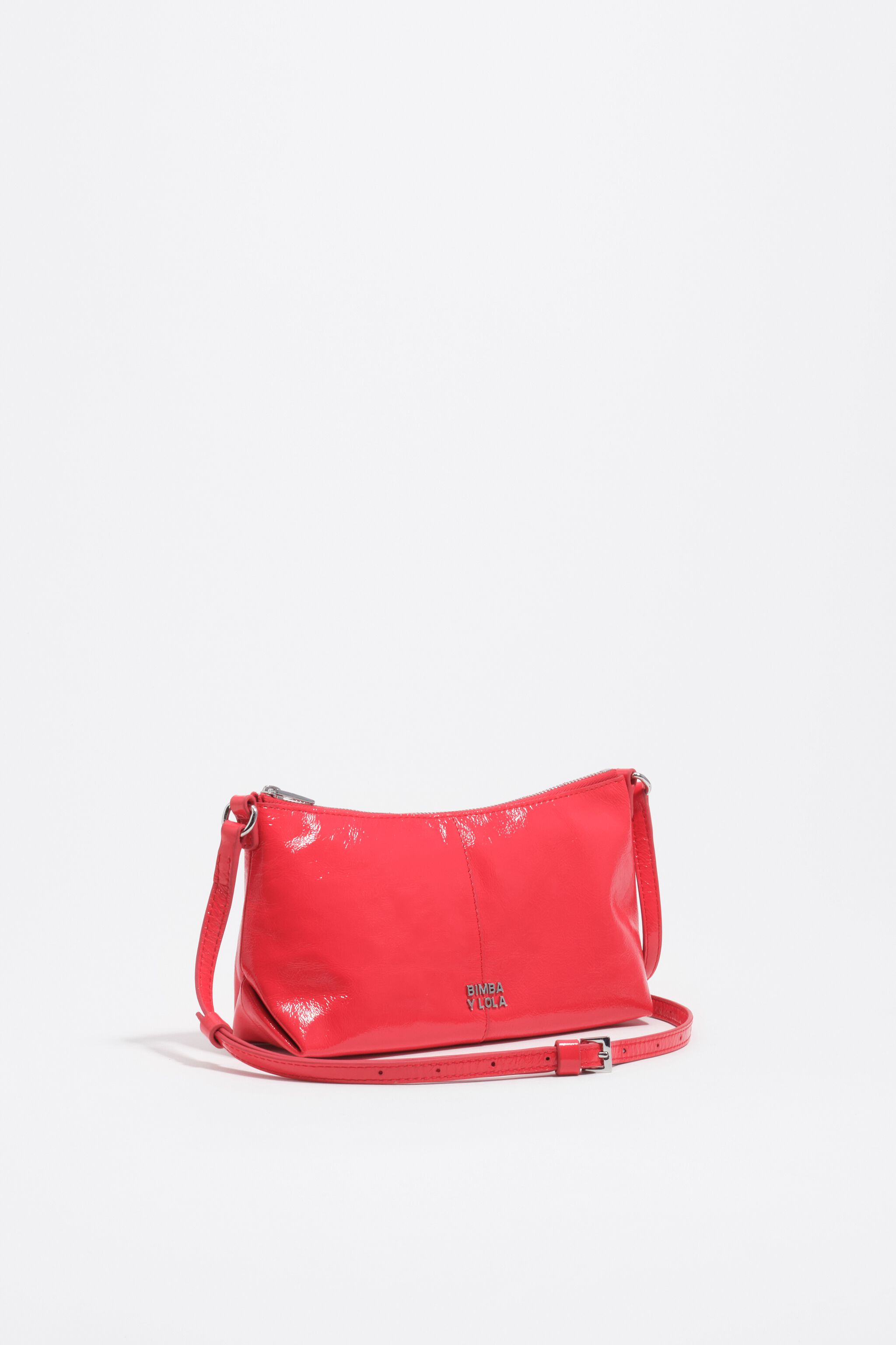 Bolso cruzado de cuero brillante rojo ácido mini