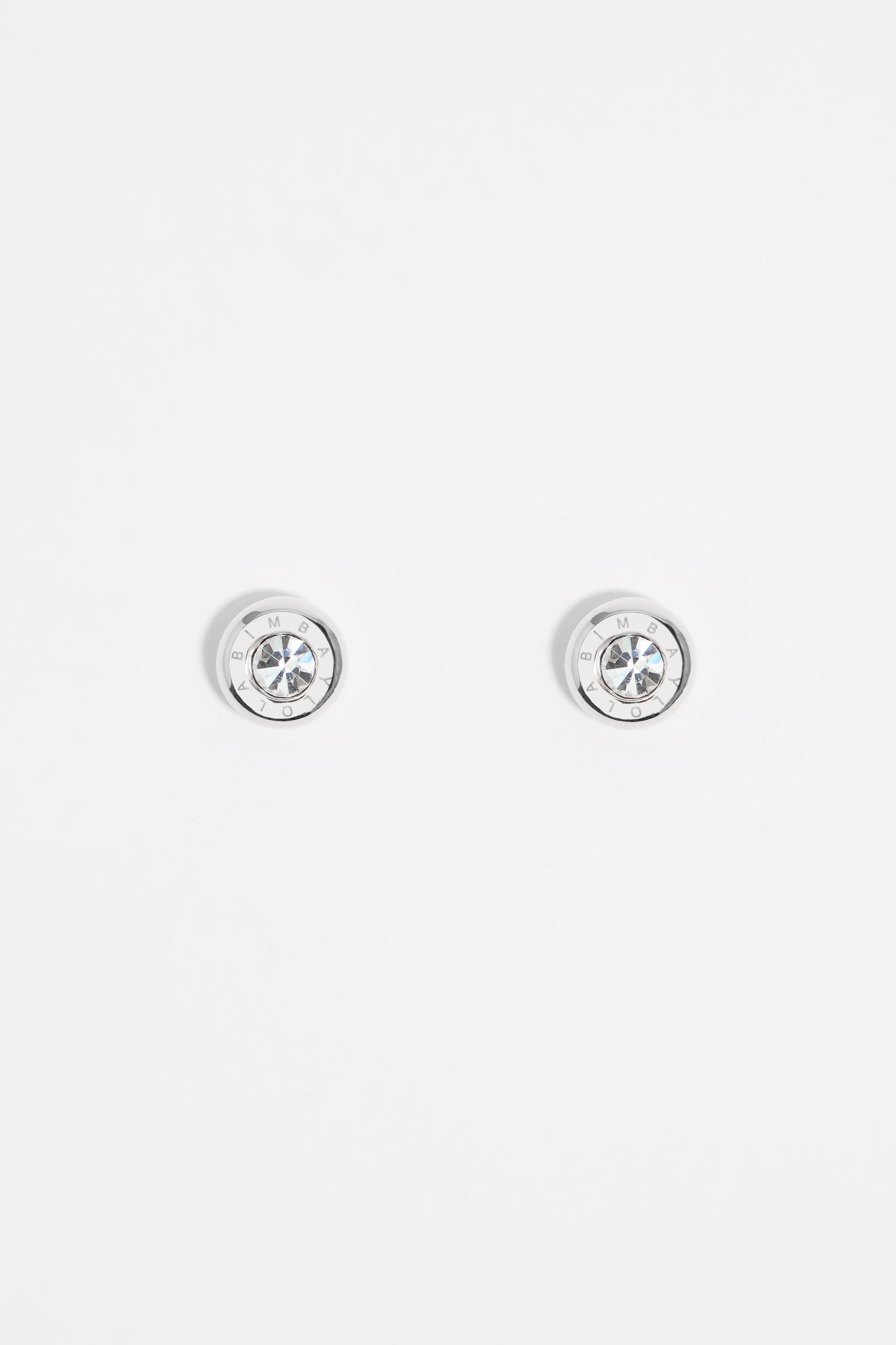 Auriculares de plata con logotipo y cristal