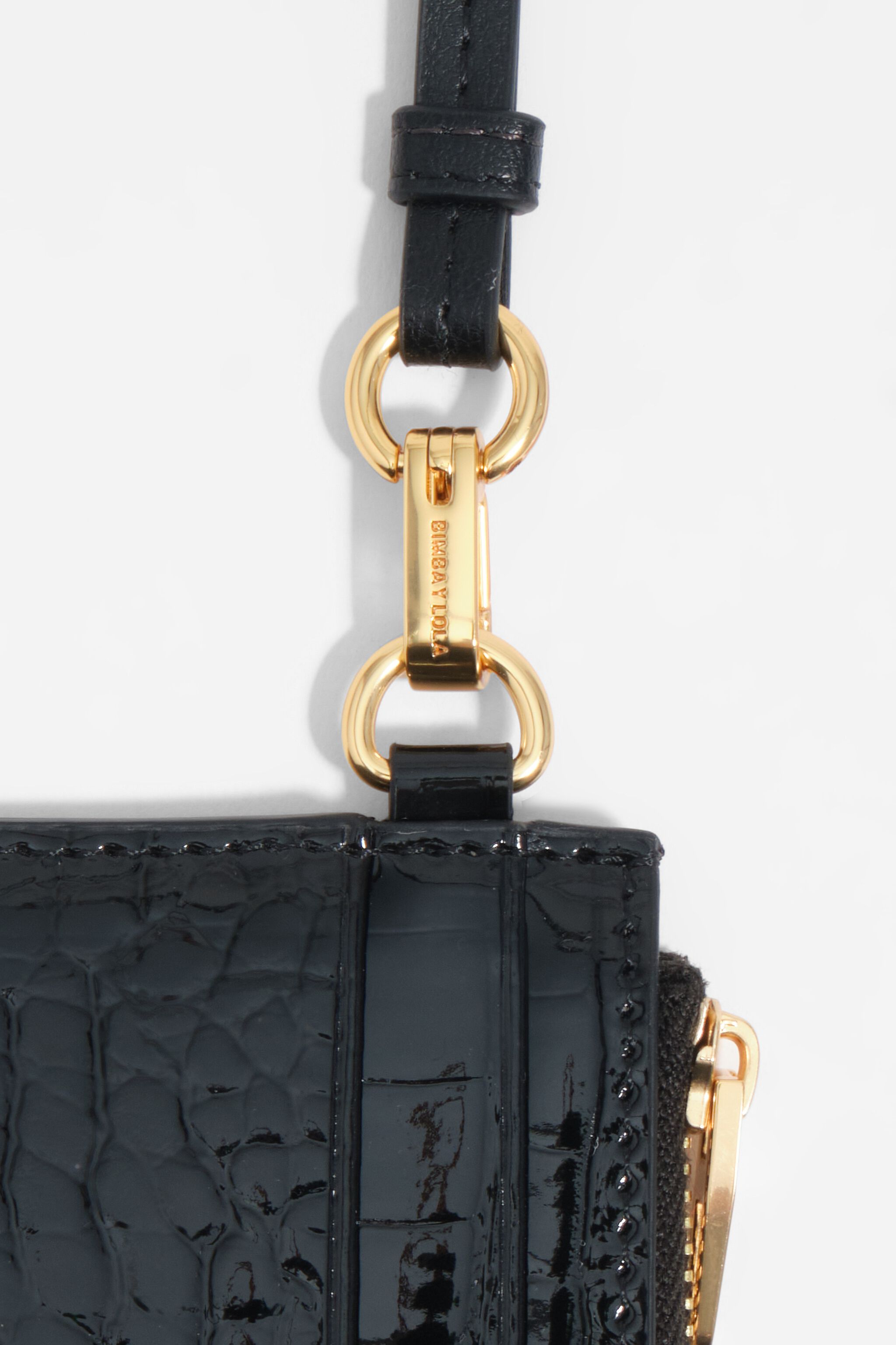 Porta tarjetas/billetera con estampado de cocodrilo negro