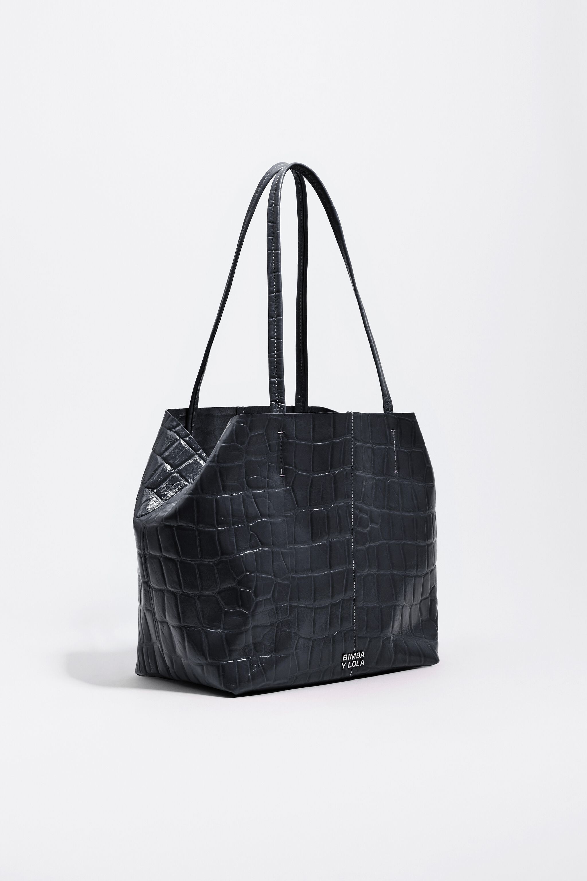 Bolso bandolera de cuero mediano en azul petróleo con estampado de cocodrilo