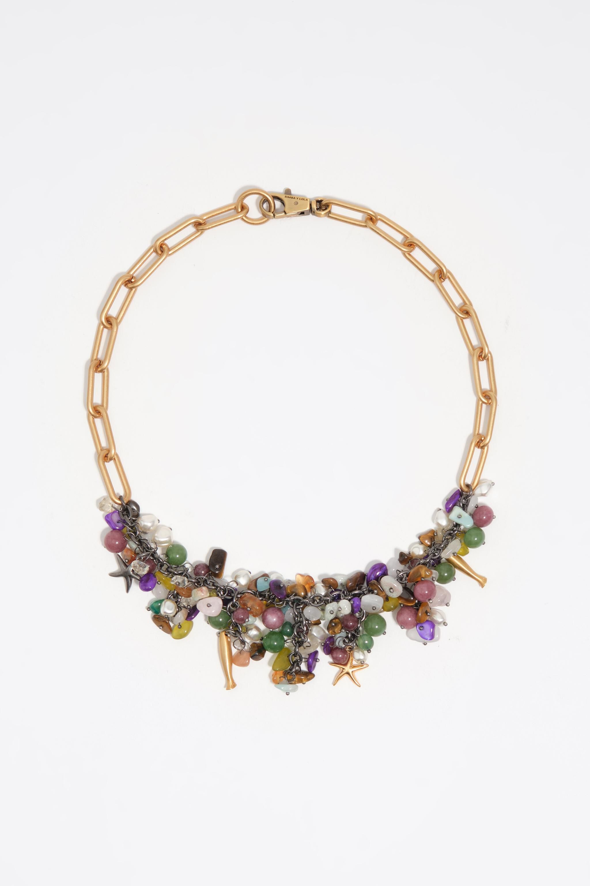 Collar de oro envejecido con piedras y pez