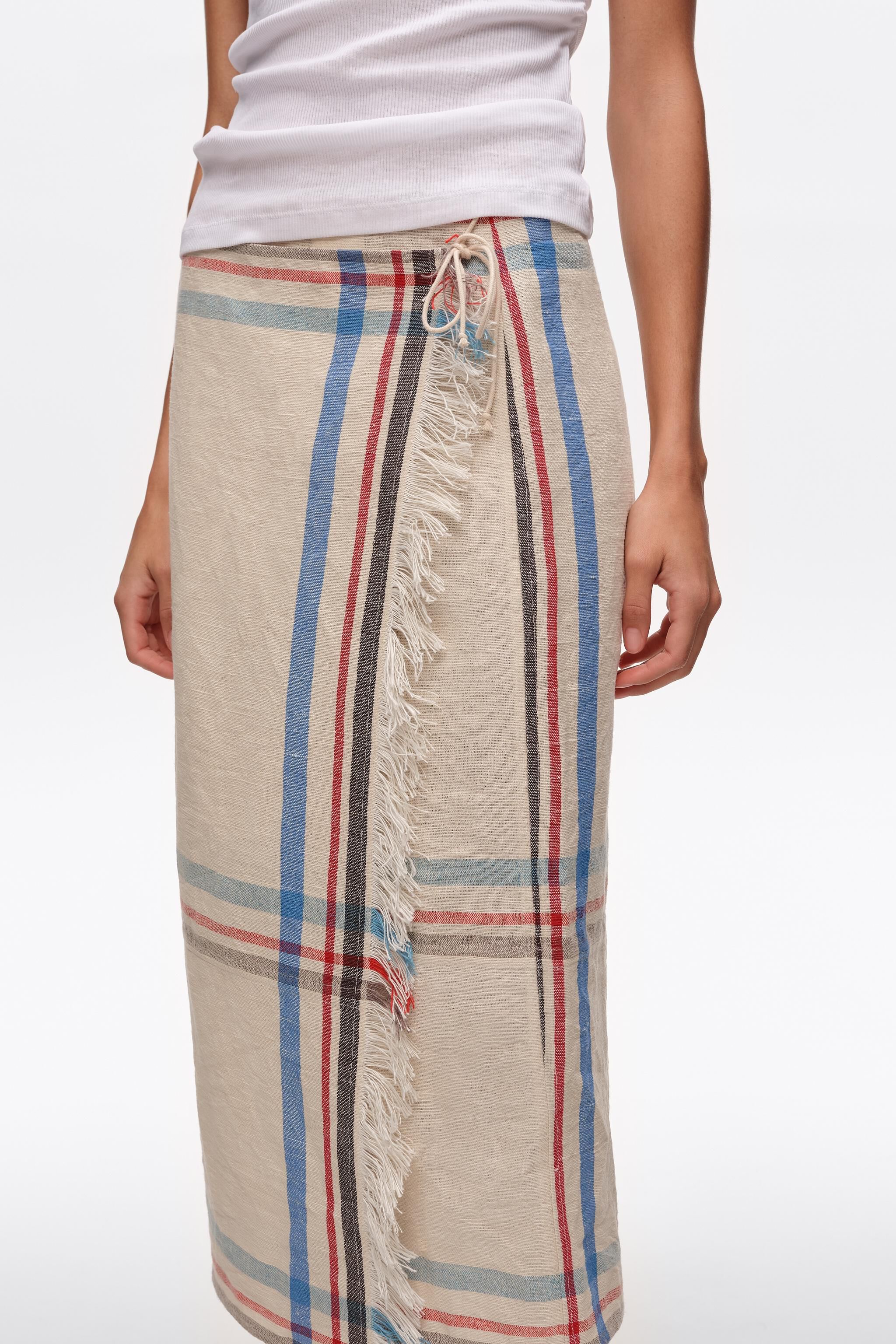 Falda midi recta de lino con rayas ecru