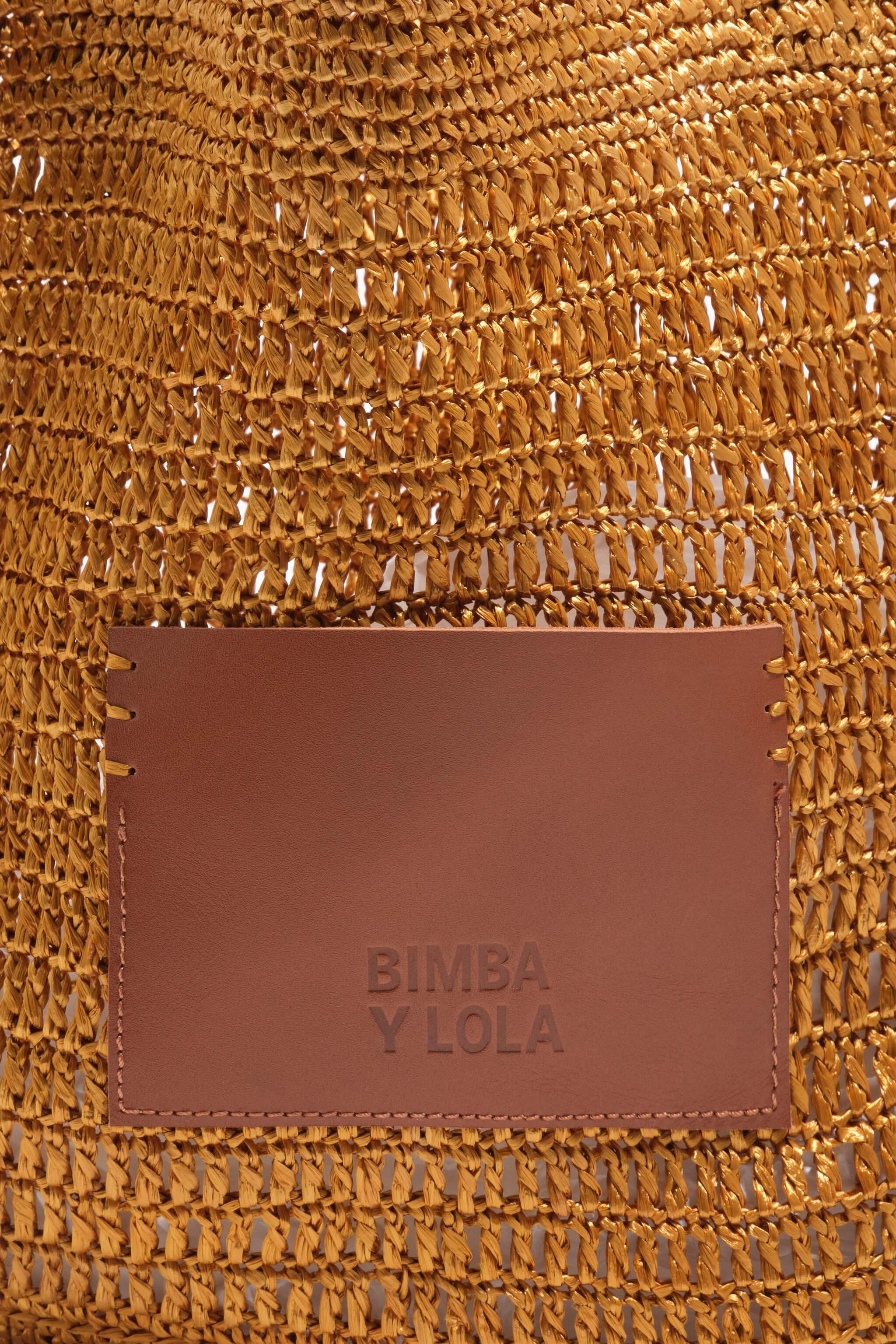 Bolso grande con trenza dorada