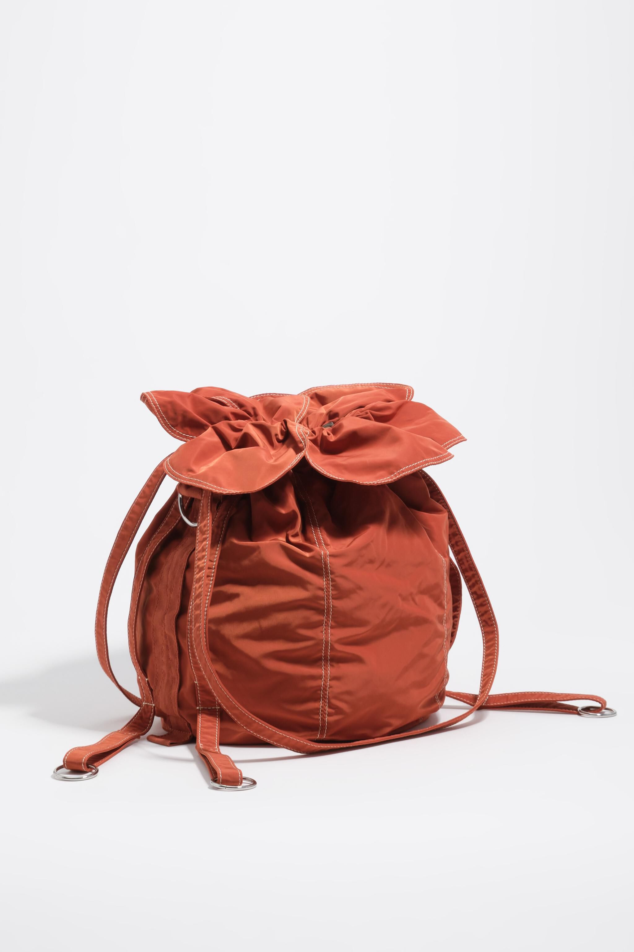 Bolso Pétalo grande tejido naranja quemado