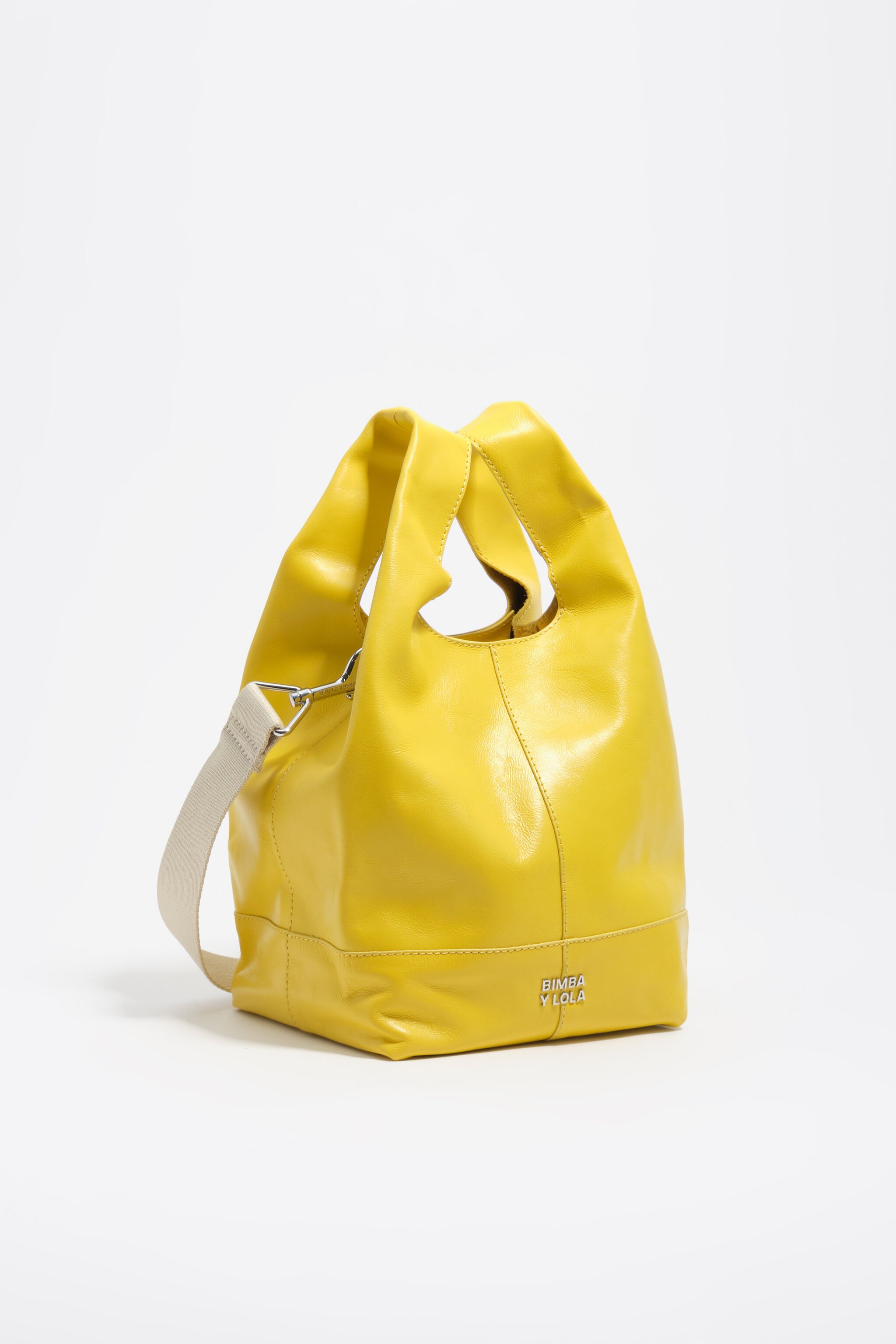 Bolso cruzado de cuero amarillo mediano