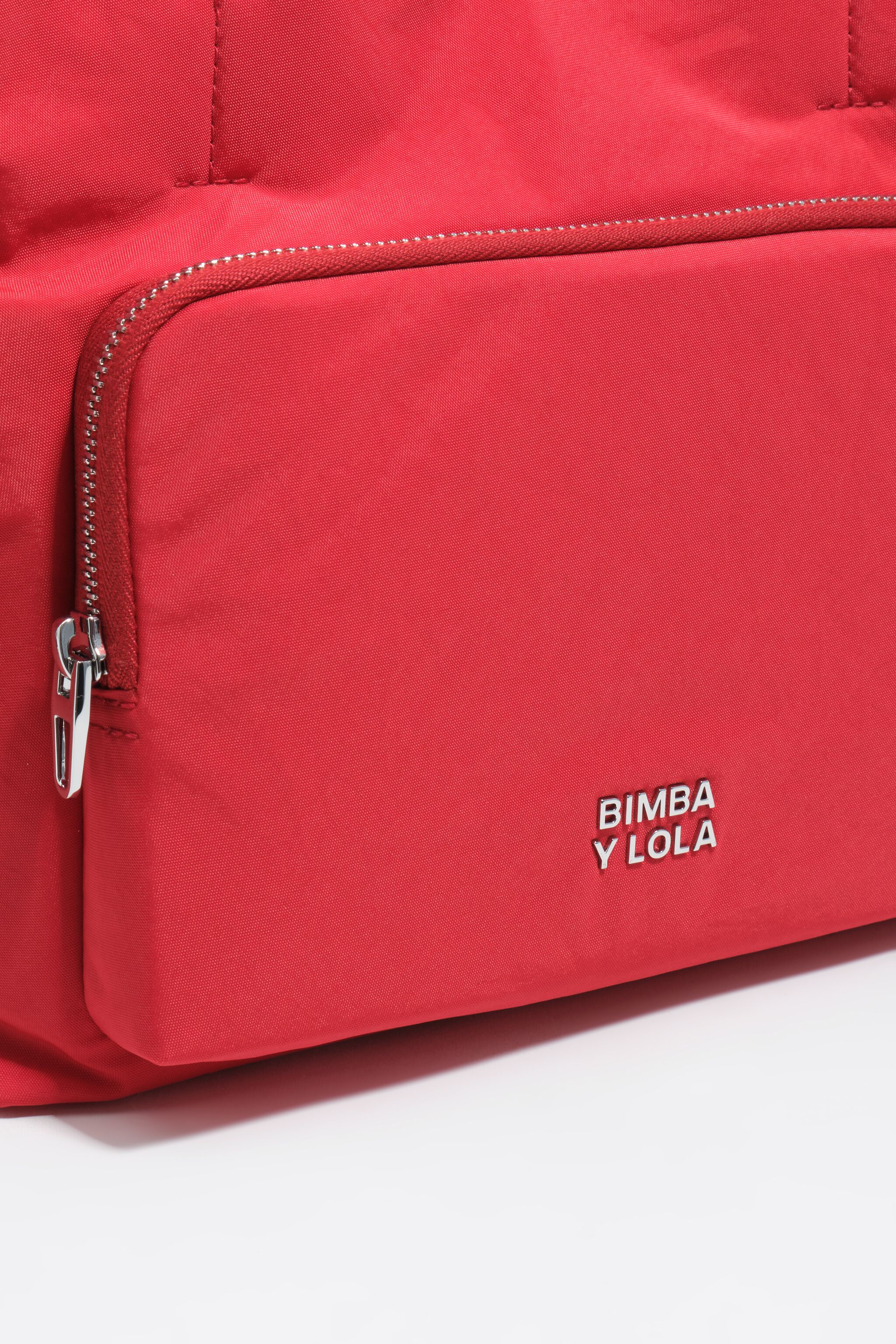 Bolso cruzado de bolsillo de nailon rojo mediano