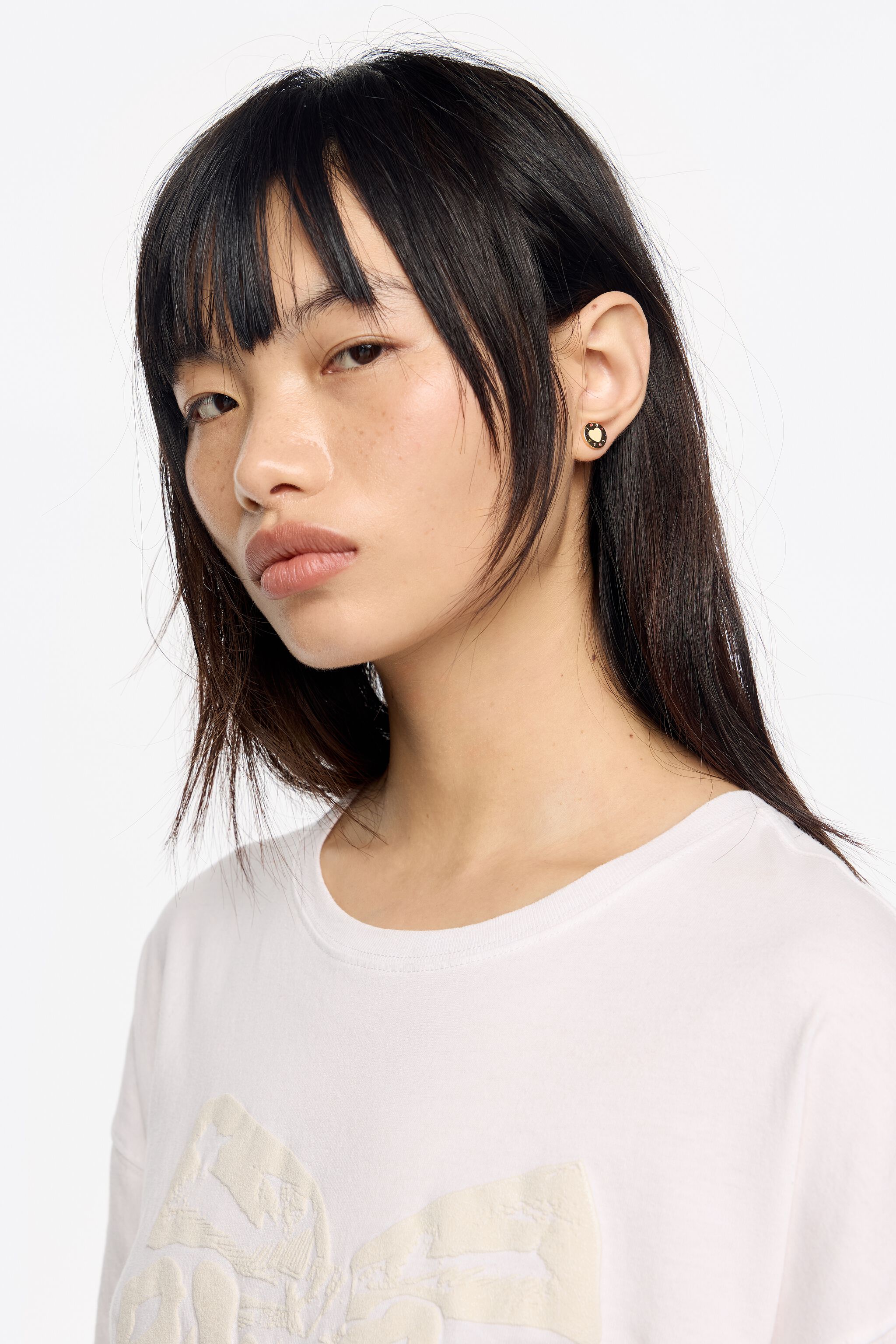 Aretes con logo de corazón ivory