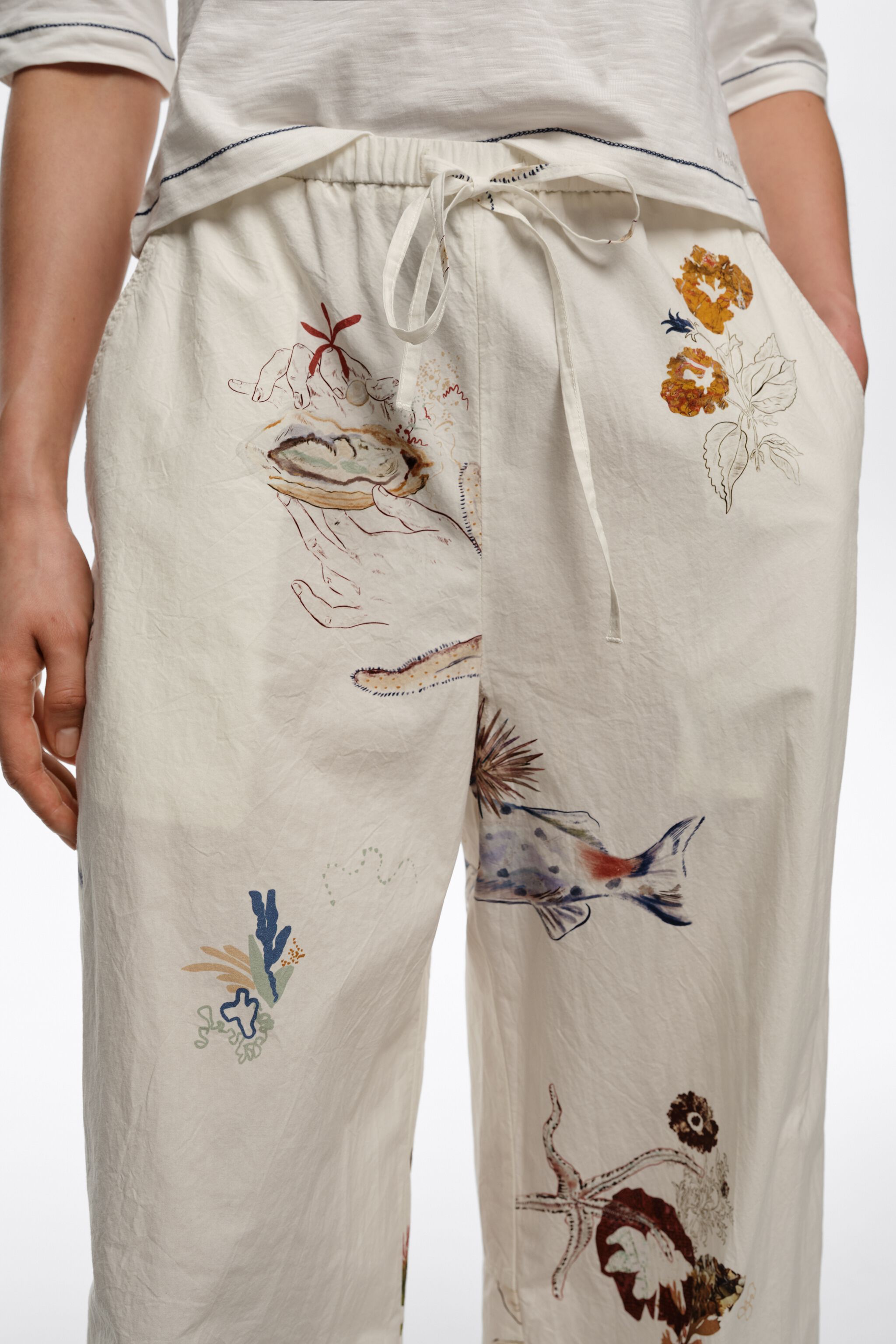 Pantalones jogger de algodón color marfil