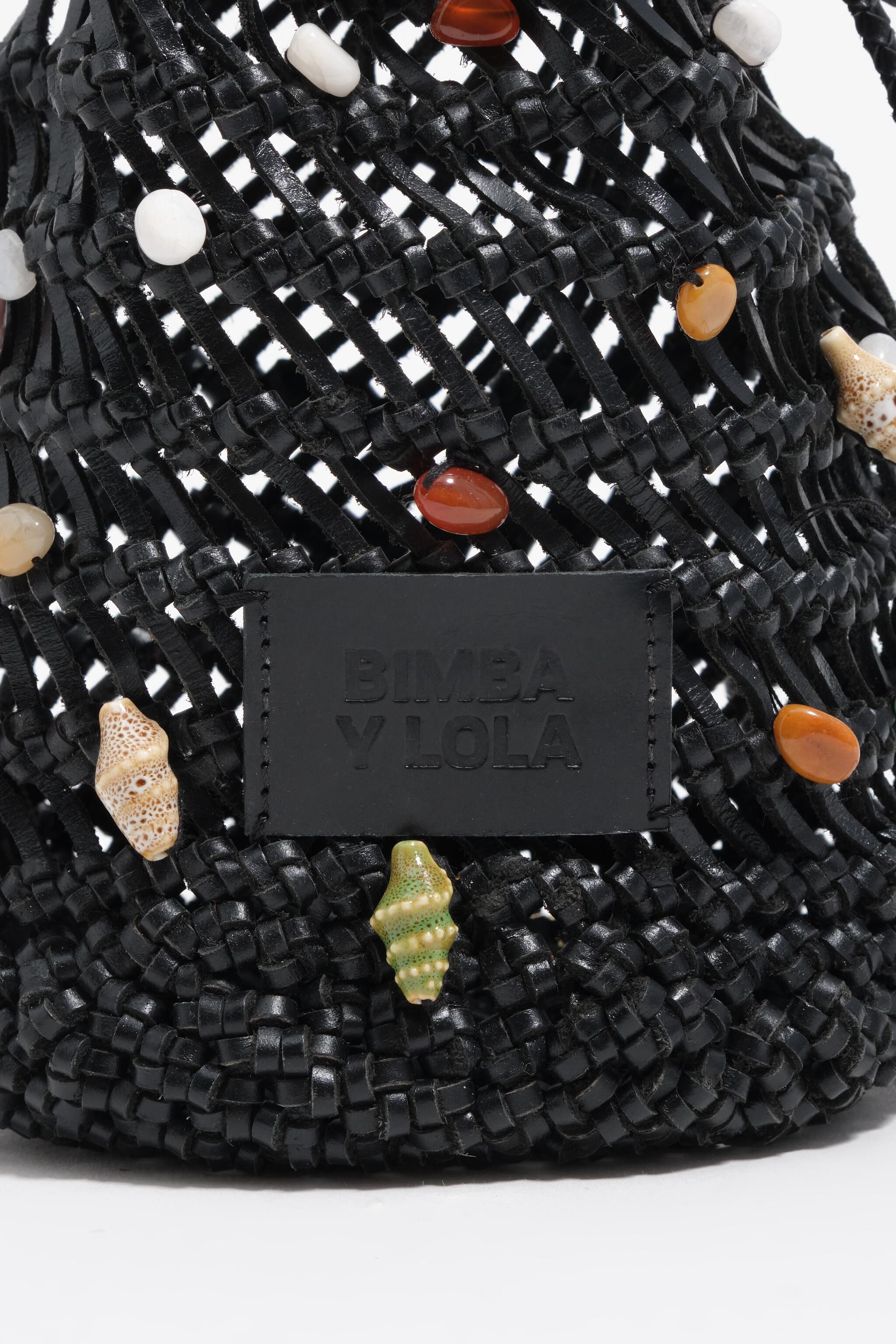 Bolso mini de cuero trenzado negro
