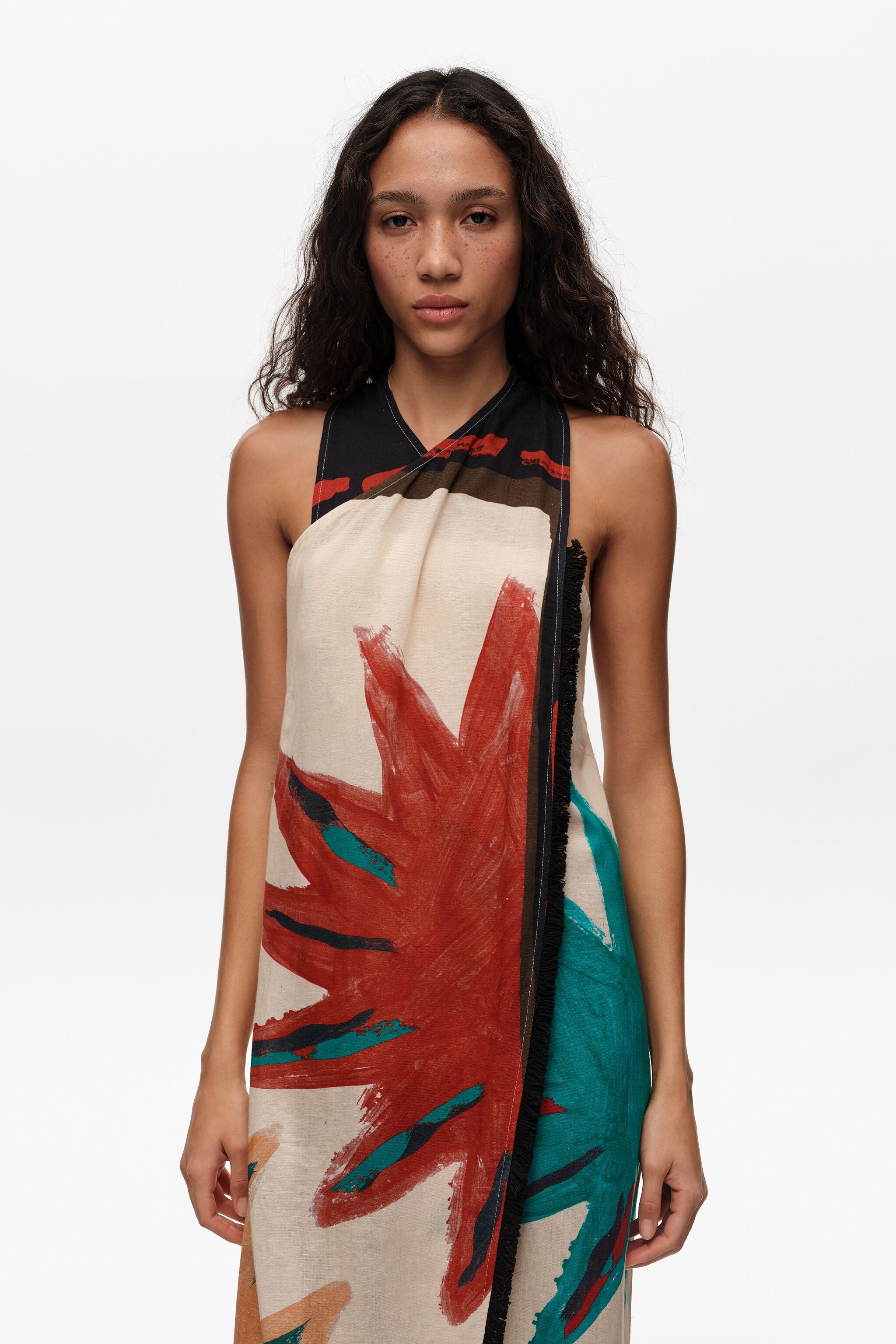 Vestido midi envolvente con flecos de posición solar