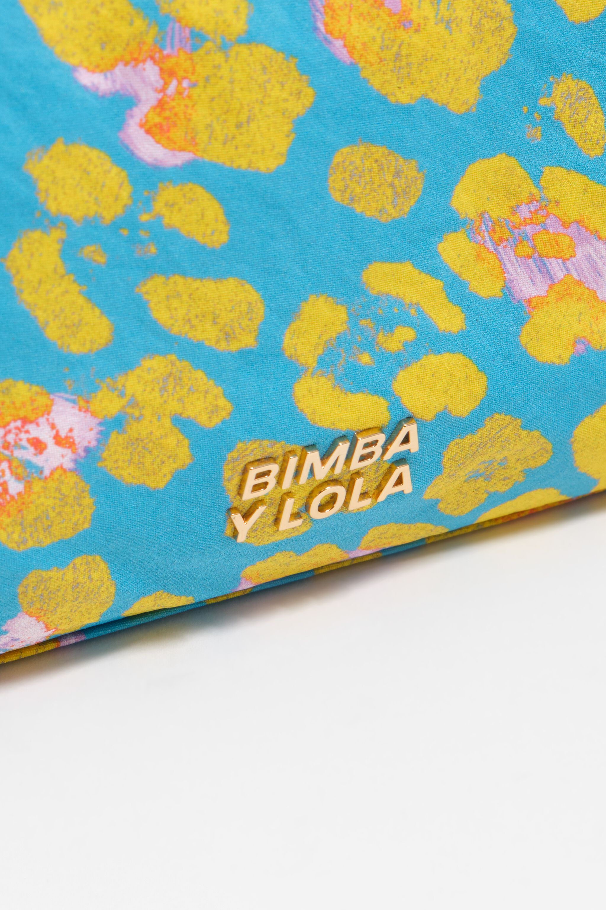 Estuche de maquillaje de nylon azul pequeño con estampado de leopardo