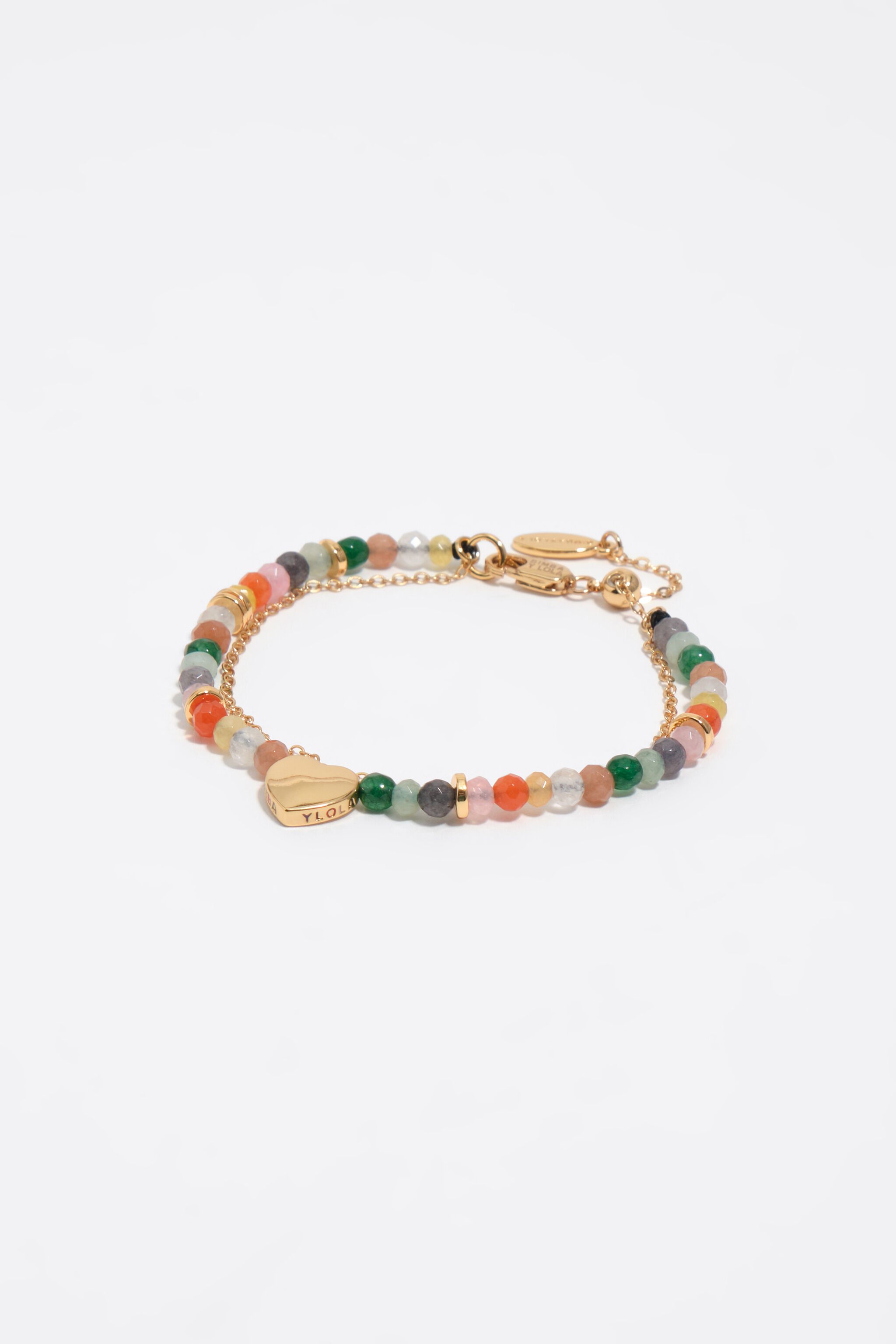 Pulsera doble de oro con piedras y corazón