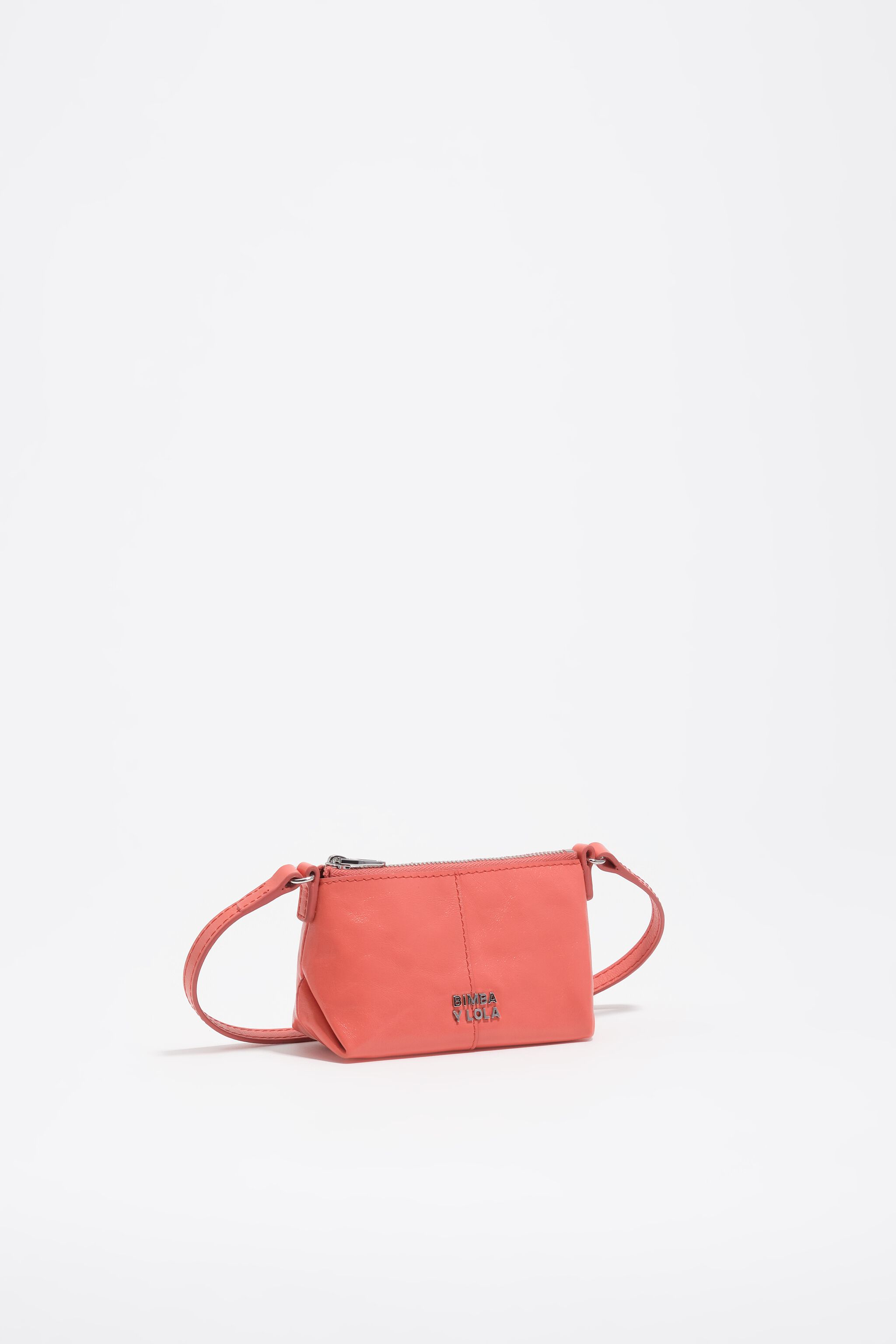 Bolso cruzado de microcuero coral