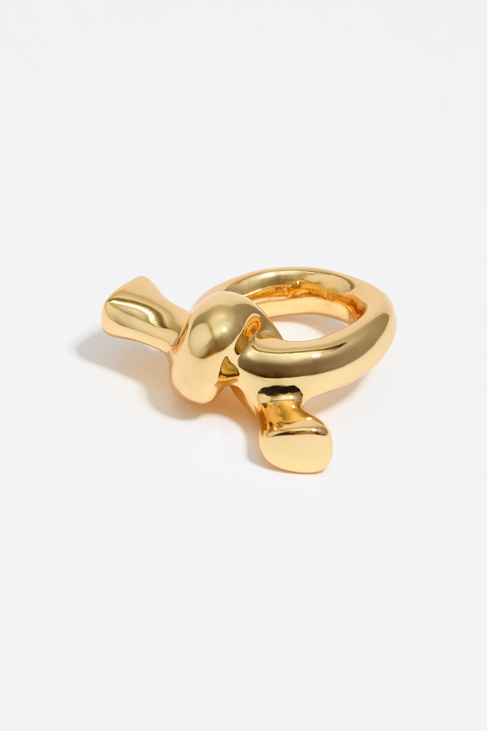 Anillo para bufanda con nudo dorado