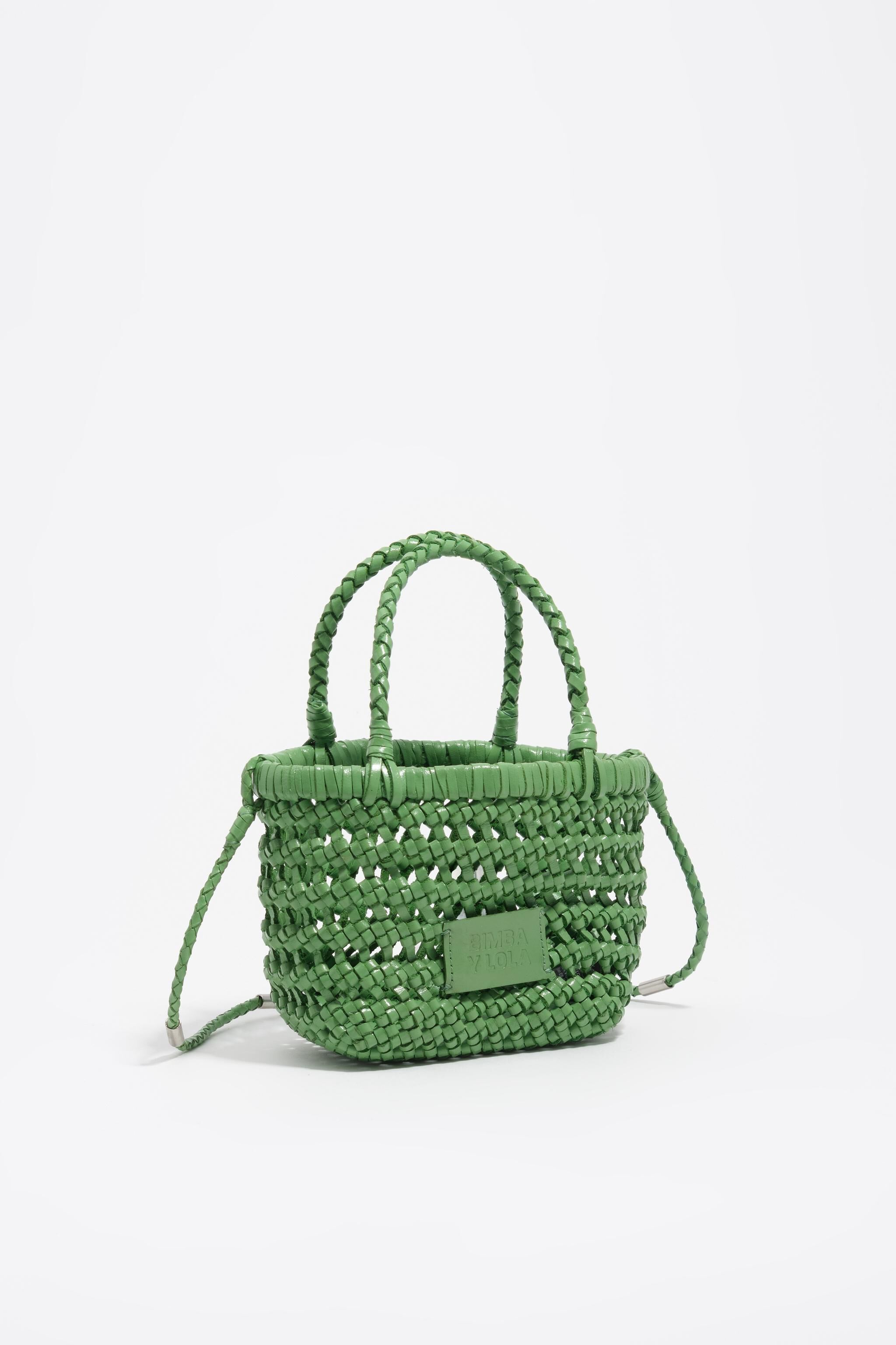 Bolso cruzado de cuero con trenzado y esmeralda