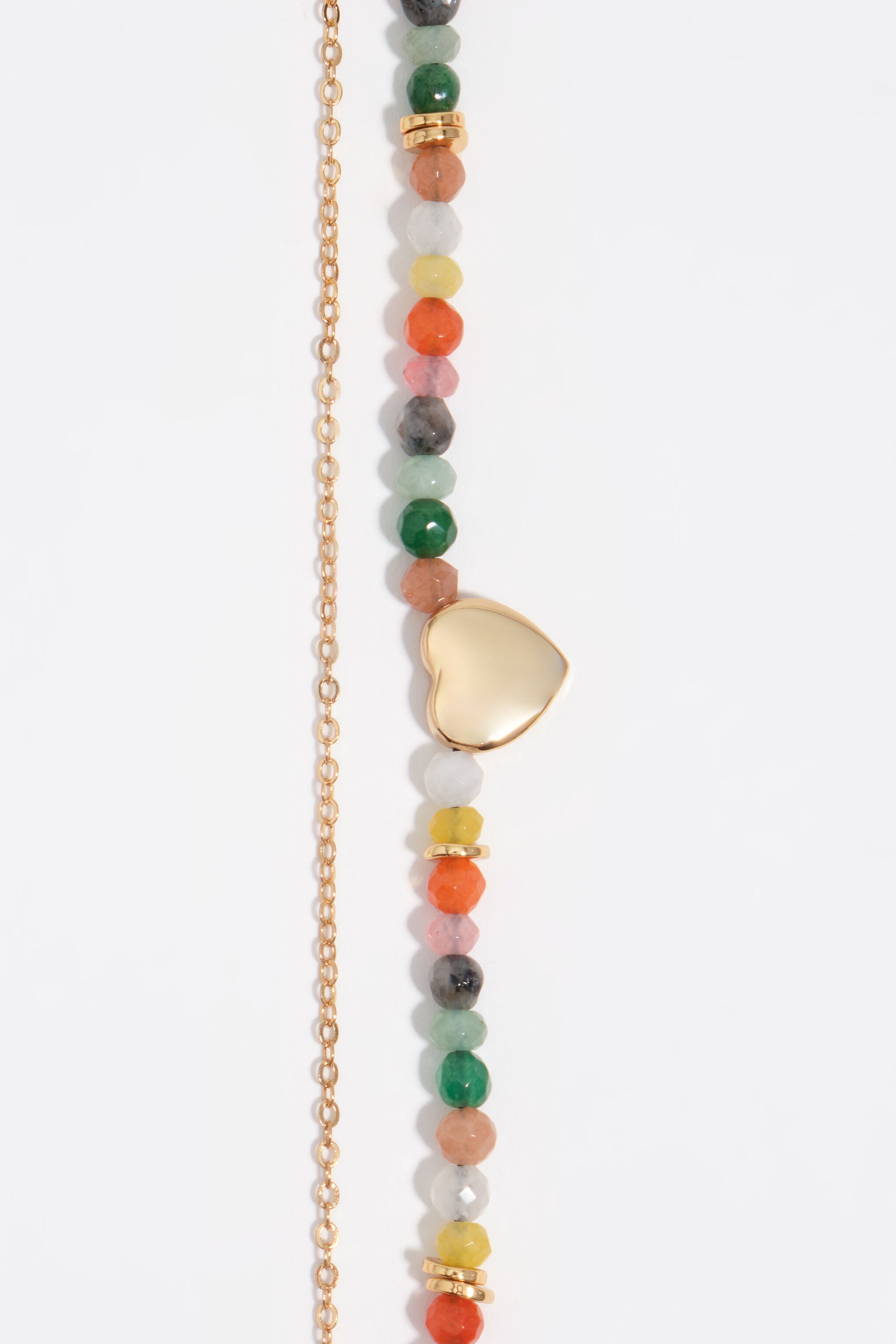 Collar doble de corazón y piedras doradas