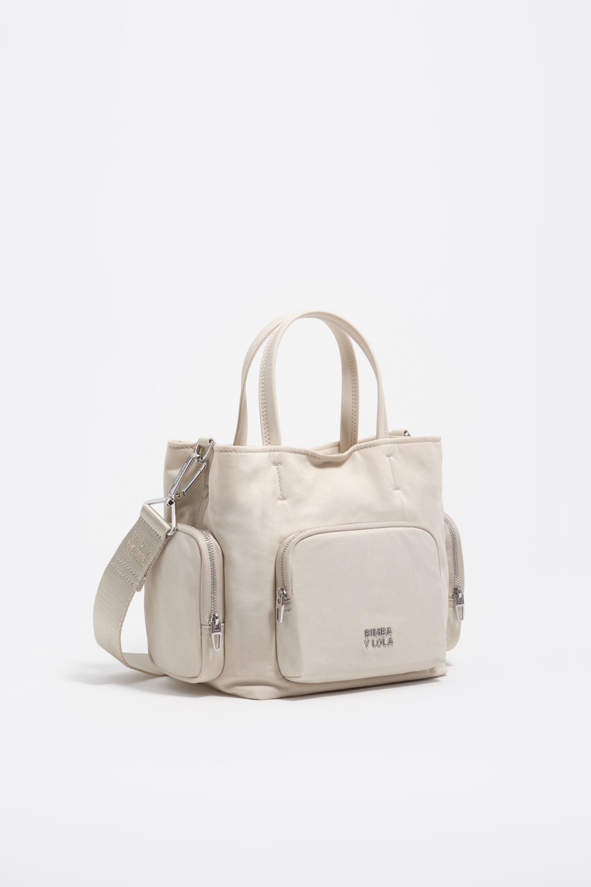 Bolsa de mano pequeña de nylon blanco con piedras