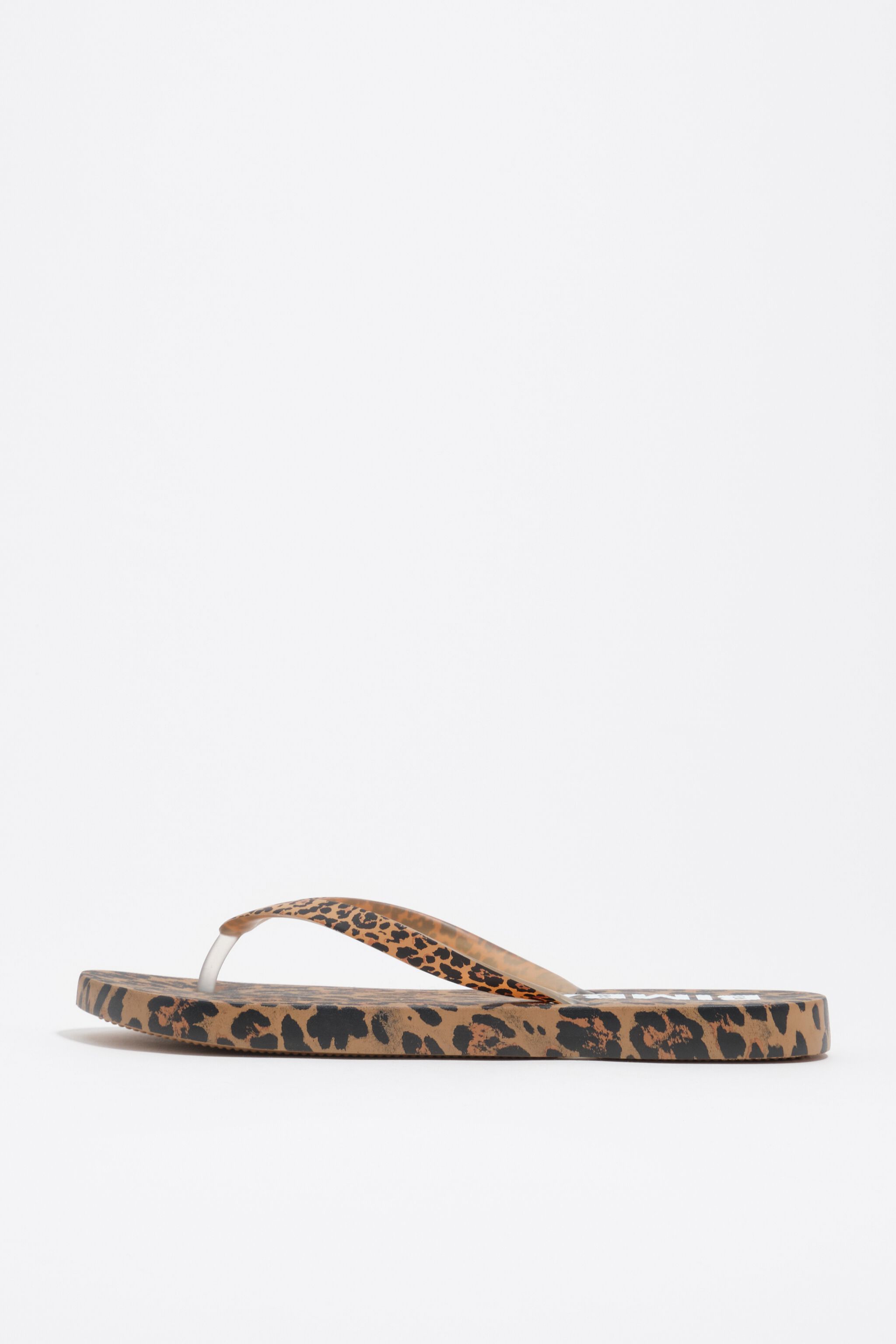 Chancleta de leopardo natural