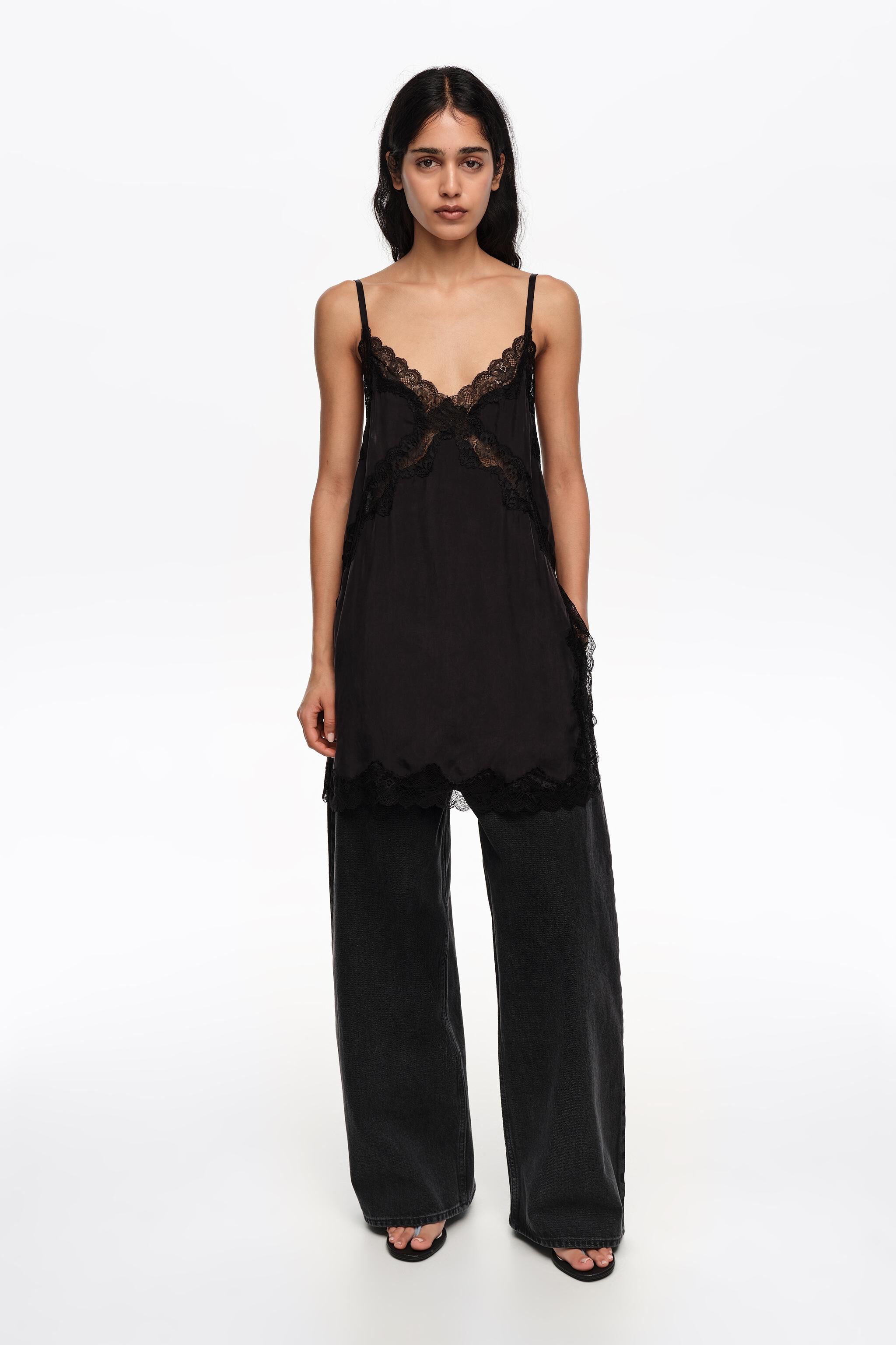 Pantalones de mezclilla negra lavada de pierna ancha