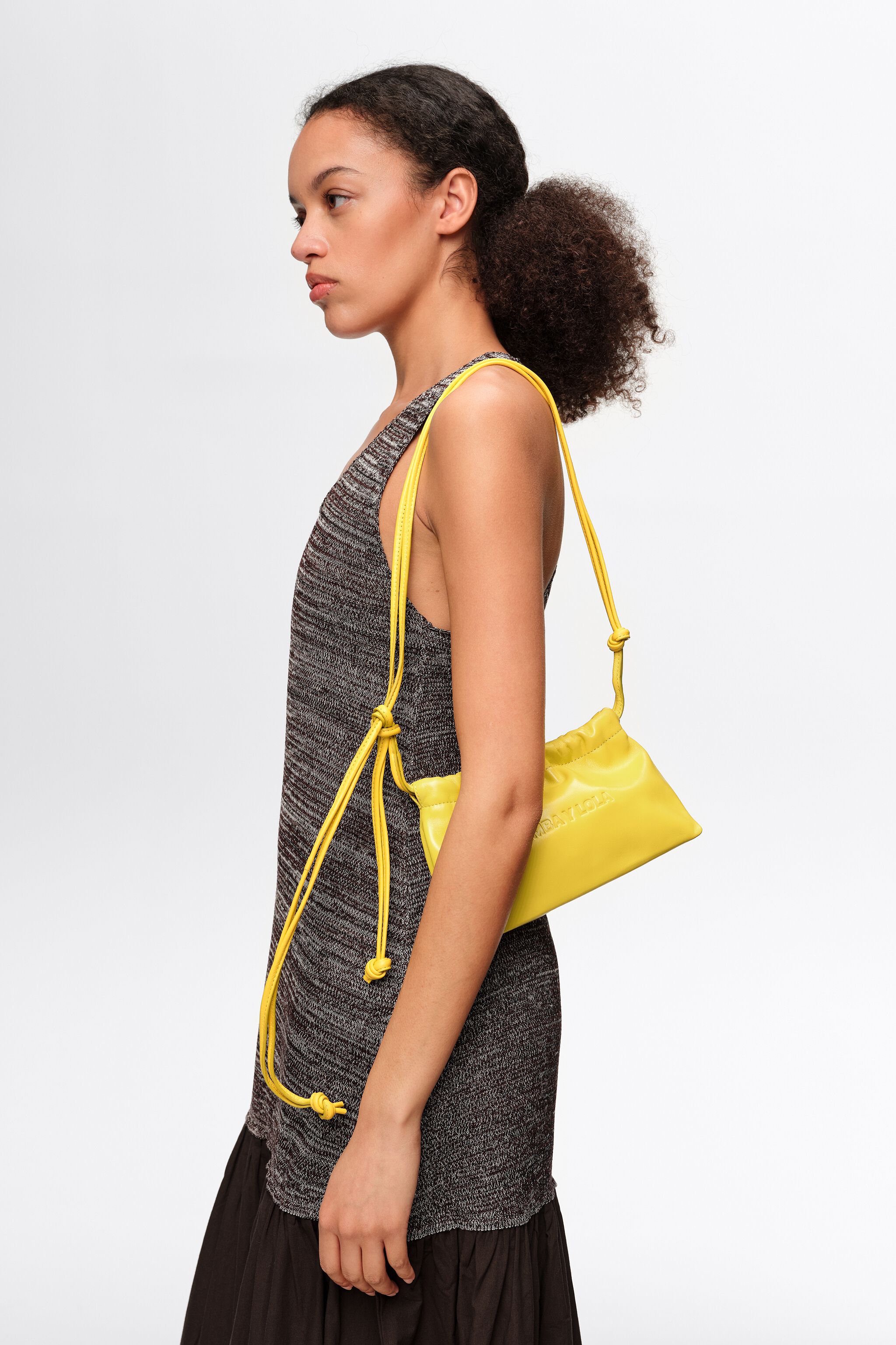 Bolso de mano mini de cuero amarillo