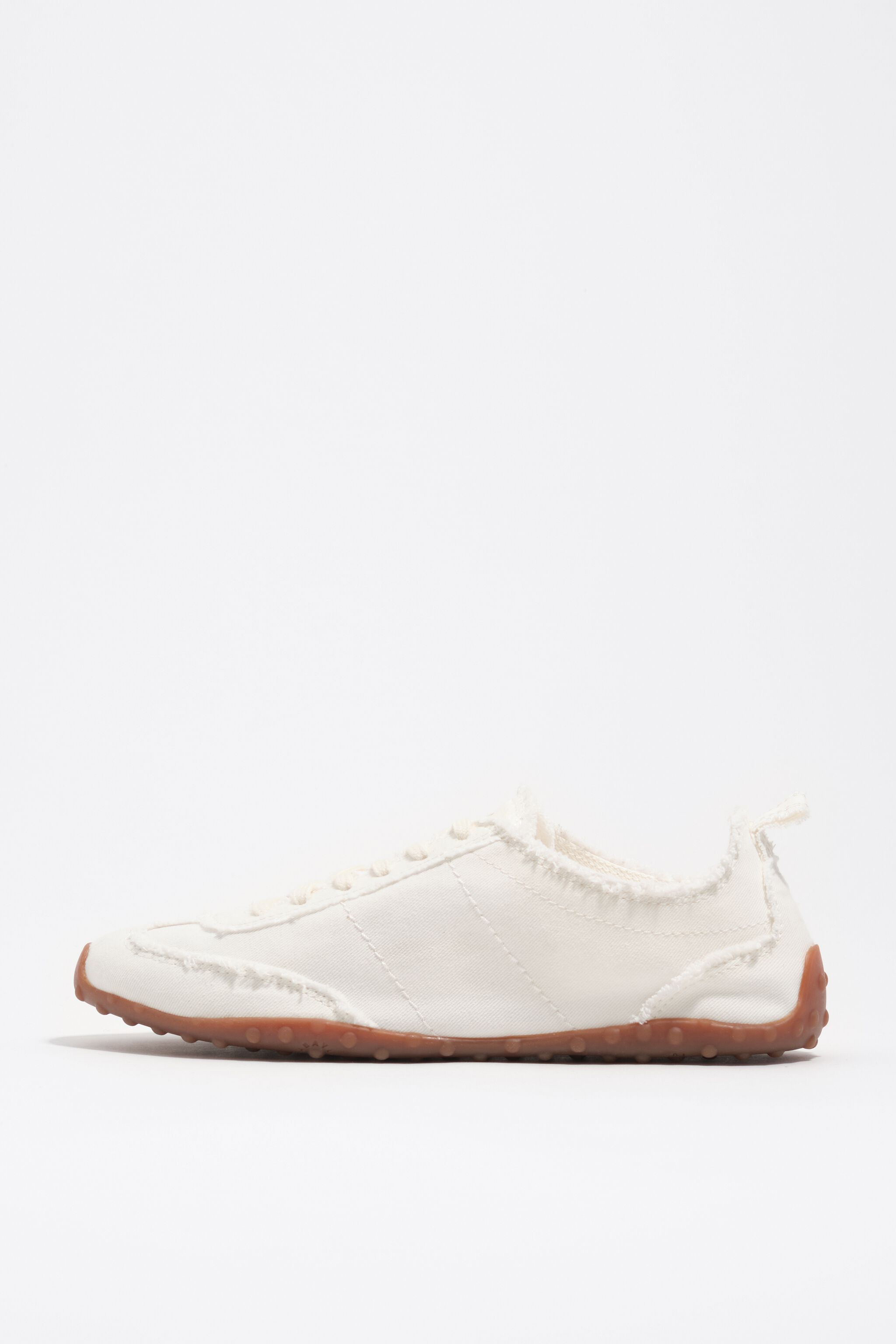 Zapatilla de tela blanca 13 39