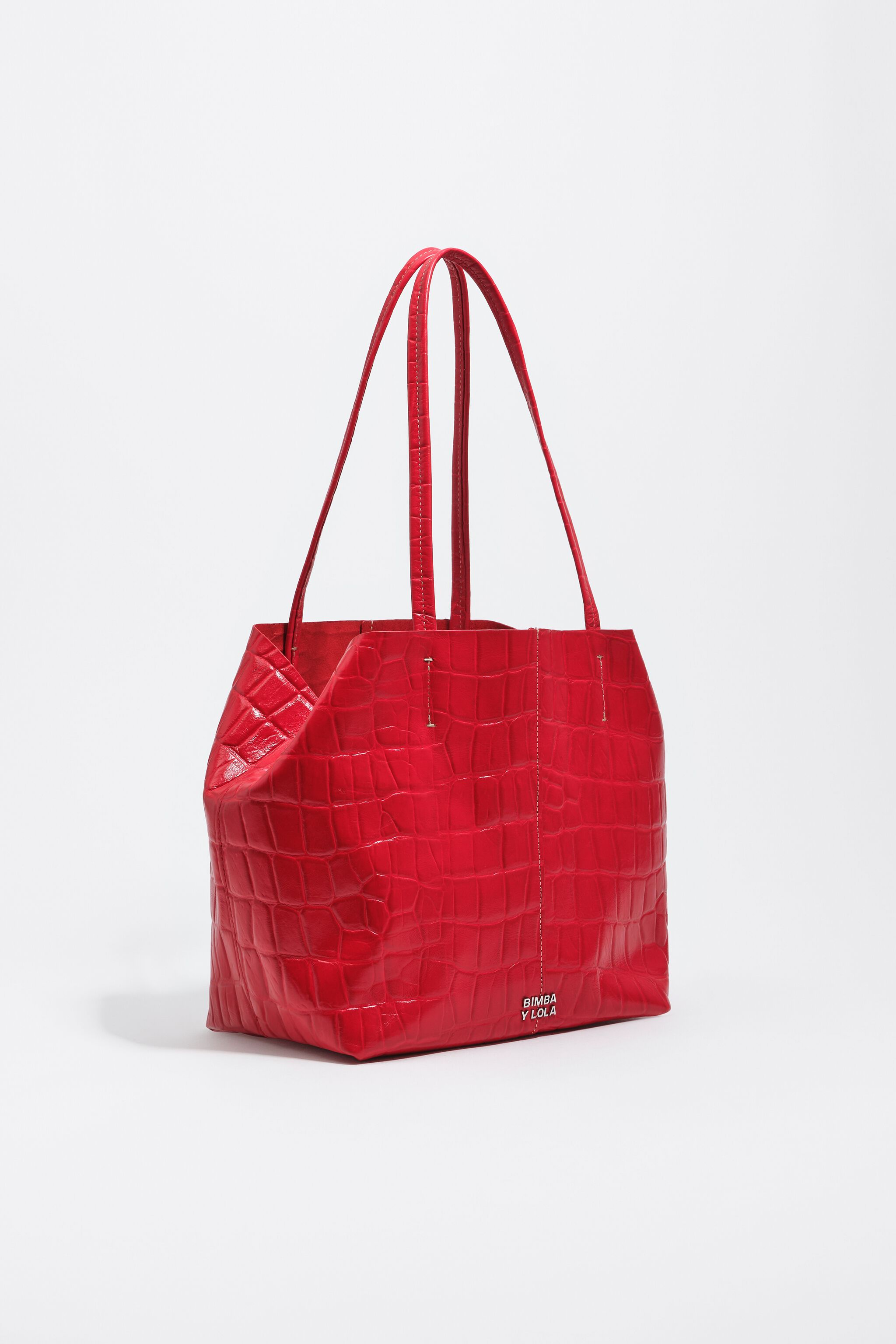 Bolso bandolera de cuero mediano en rojo con estampado de cocodrilo